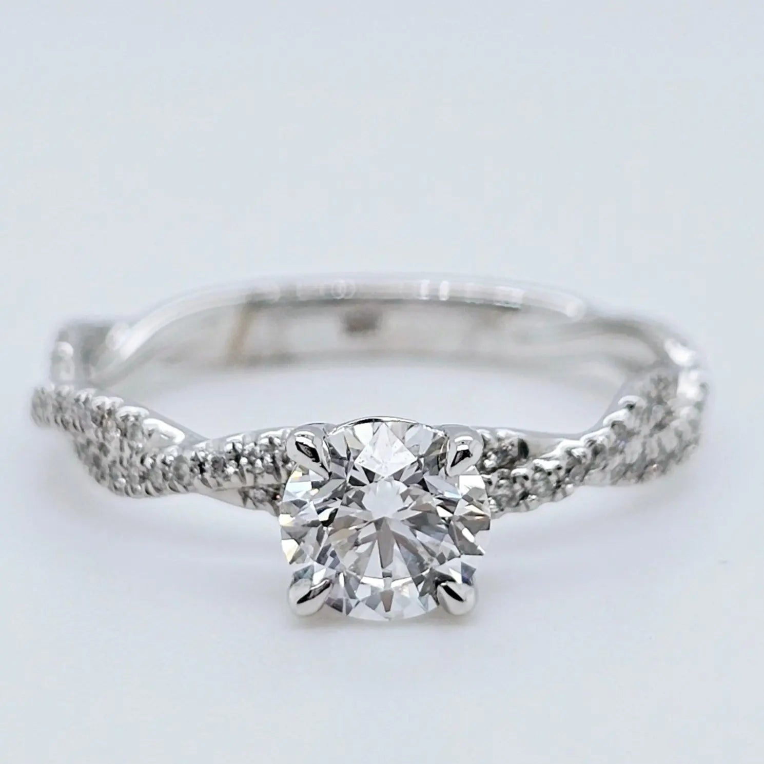 Solitaire engagement ring | Twisted band engagement ring | 18k white gold wedding ring Chloe's Jewellers