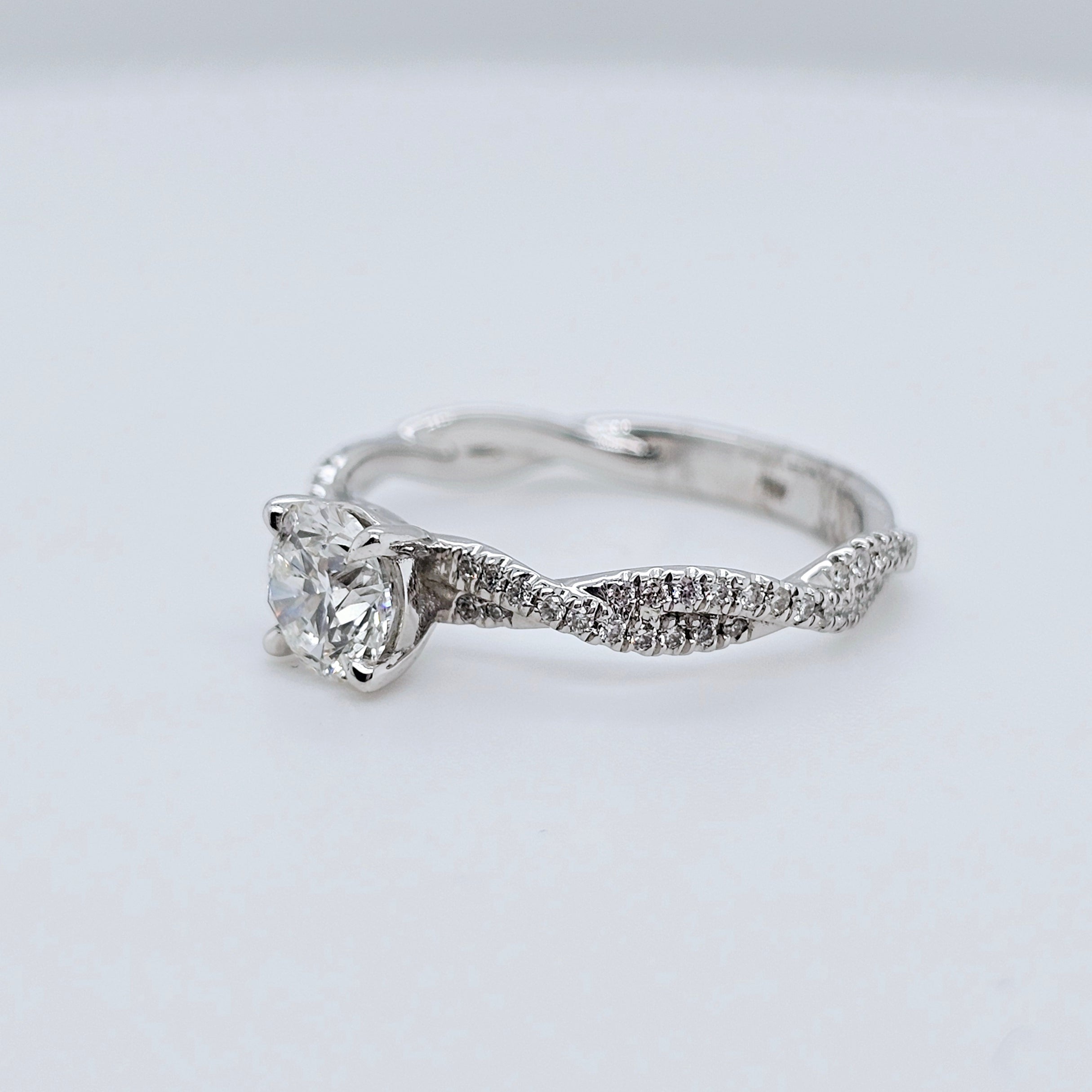 Solitaire engagement ring | Twisted band engagement ring | 18k white gold wedding ring