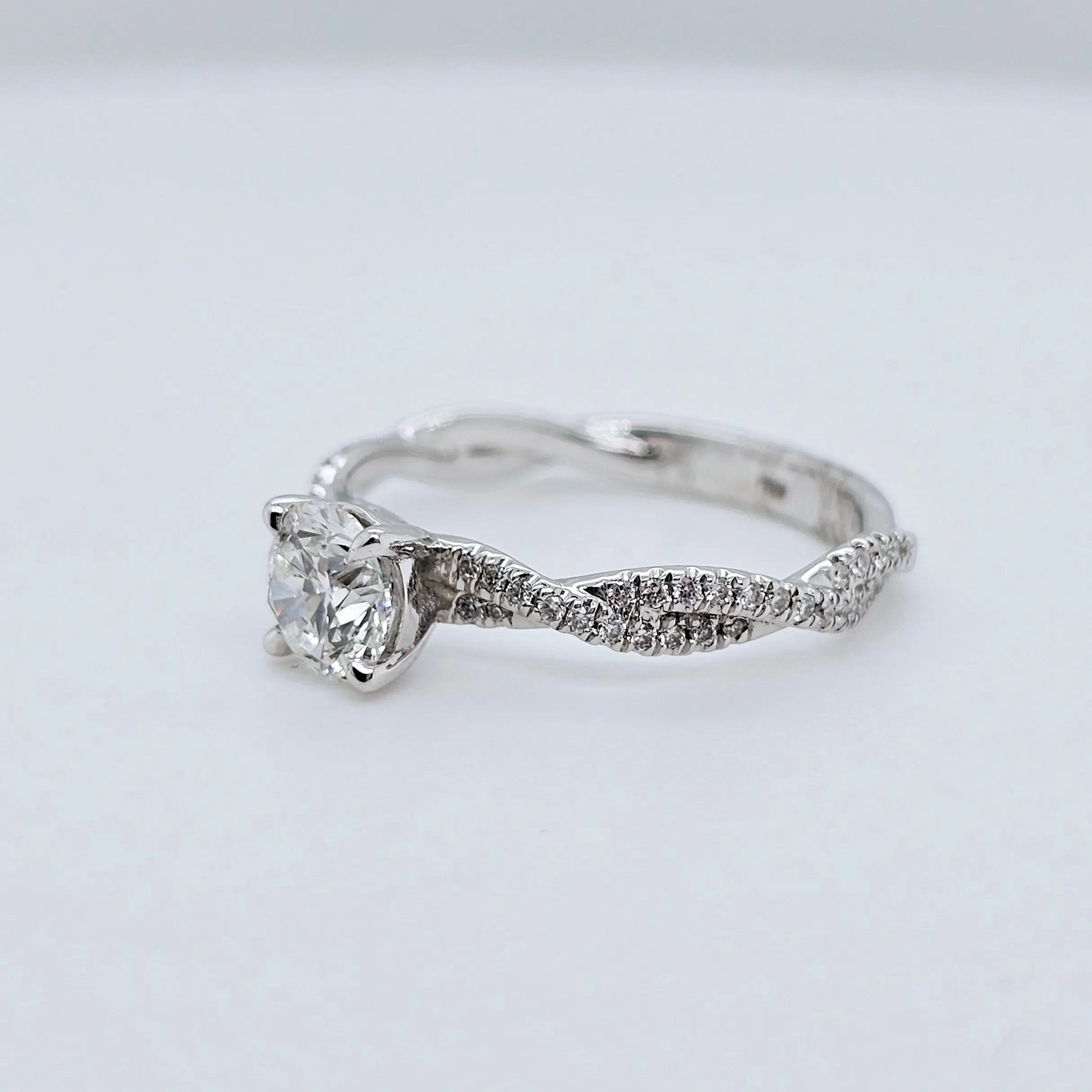 Solitaire engagement ring | Twisted band engagement ring | 18k white gold wedding ring Chloe's Jewellers