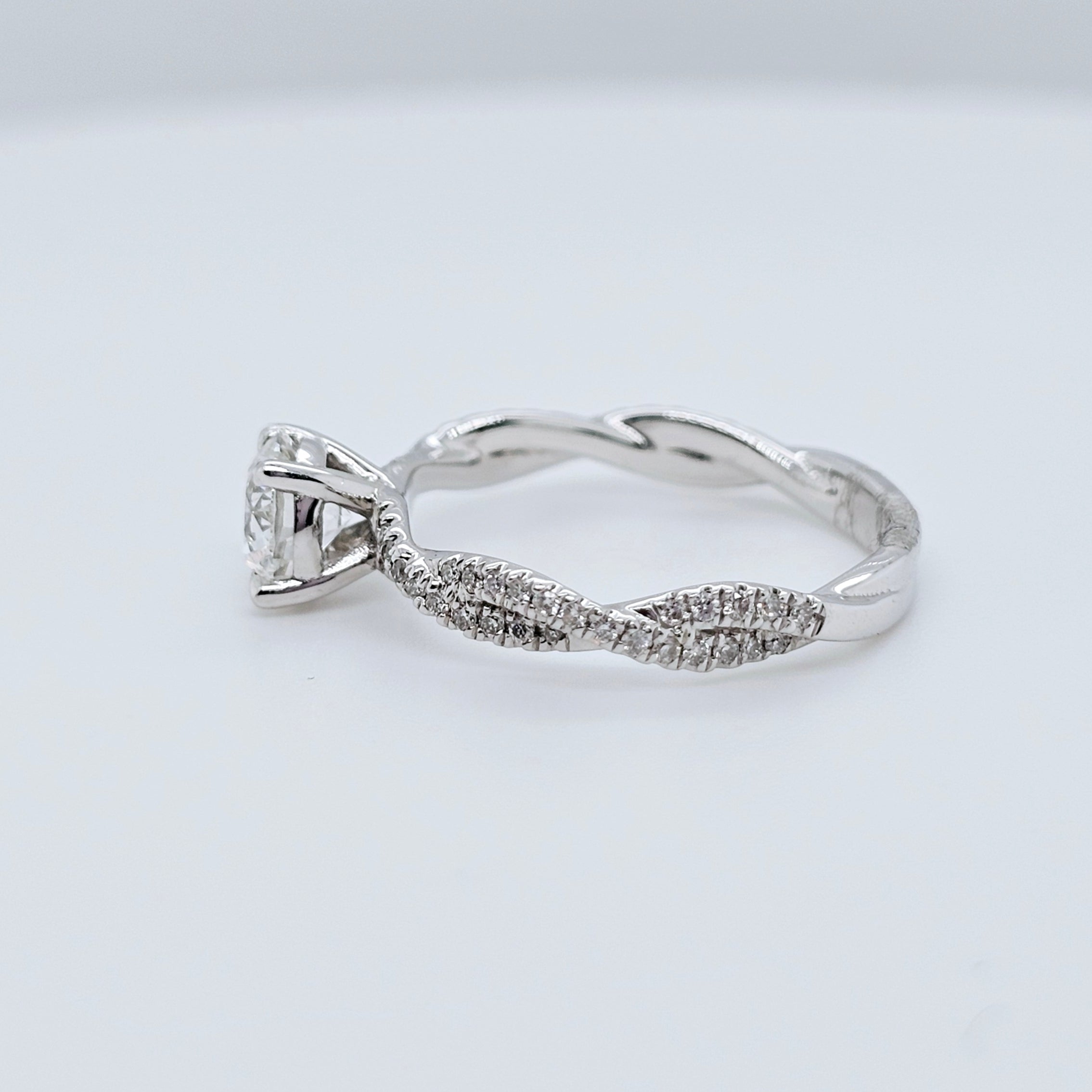 Solitaire engagement ring | Twisted band engagement ring | 18k white gold wedding ring