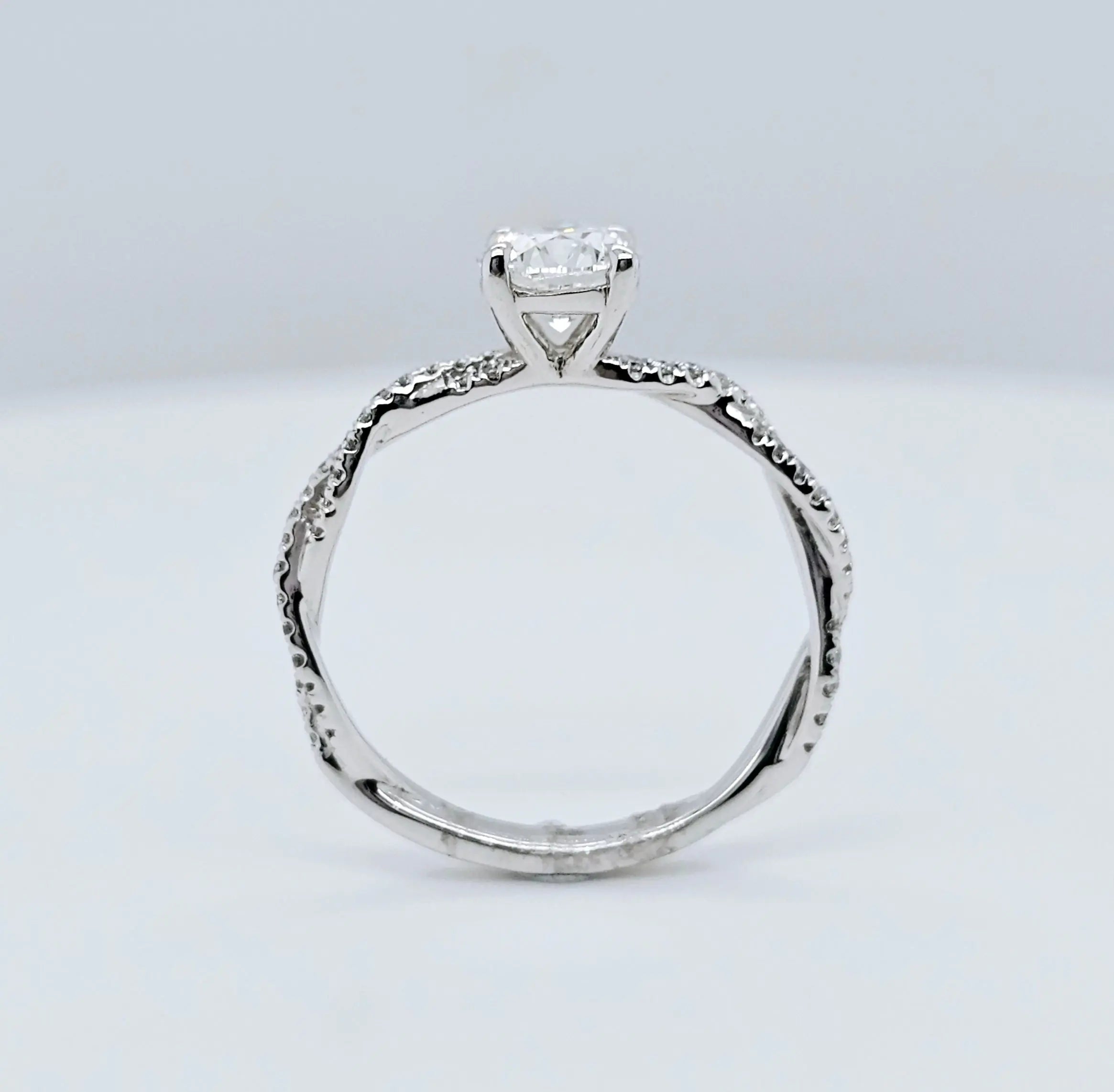 Solitaire engagement ring | Twisted band engagement ring | 18k white gold wedding ring Chloe's Jewellers