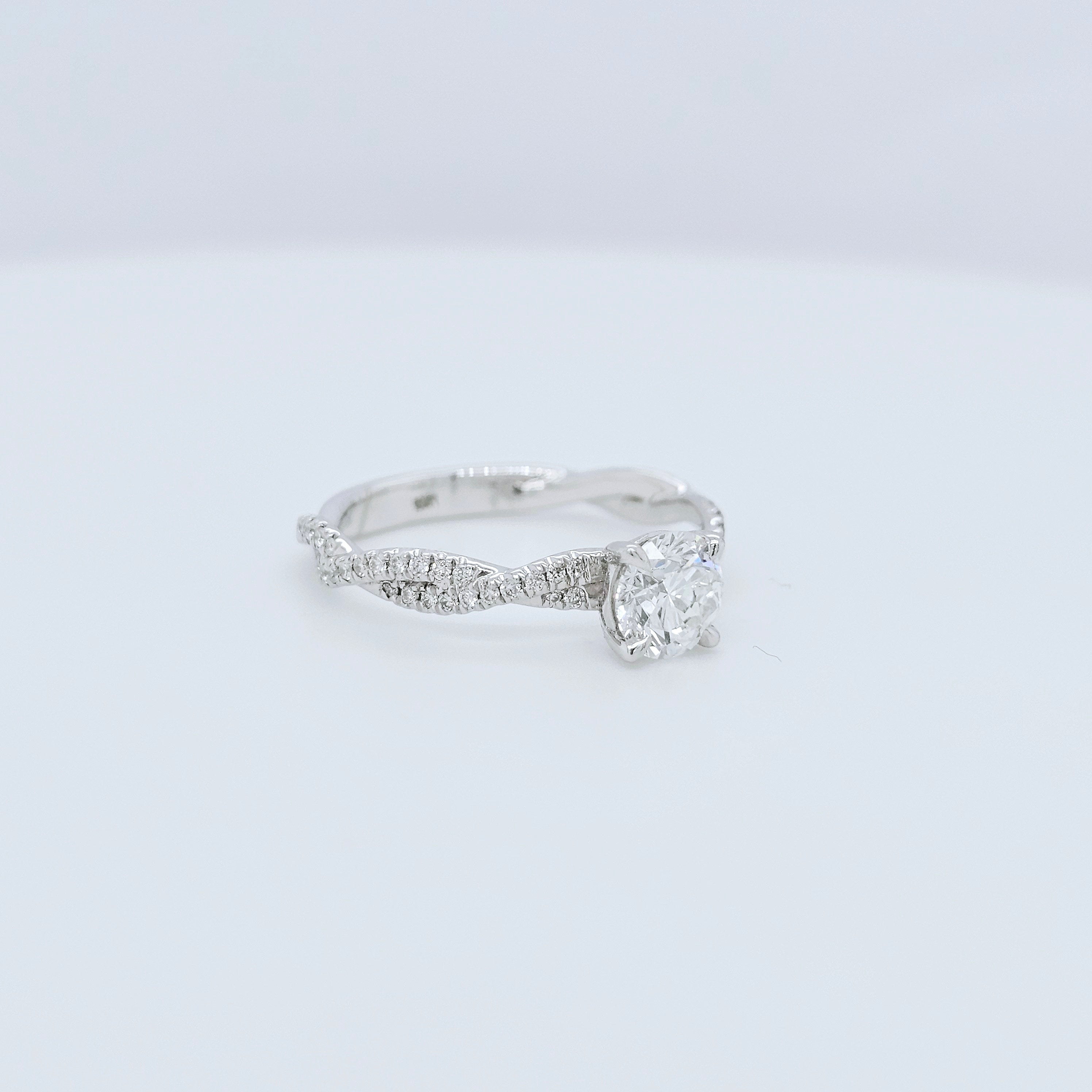 Solitaire engagement ring | Twisted band engagement ring | 18k white gold wedding ring