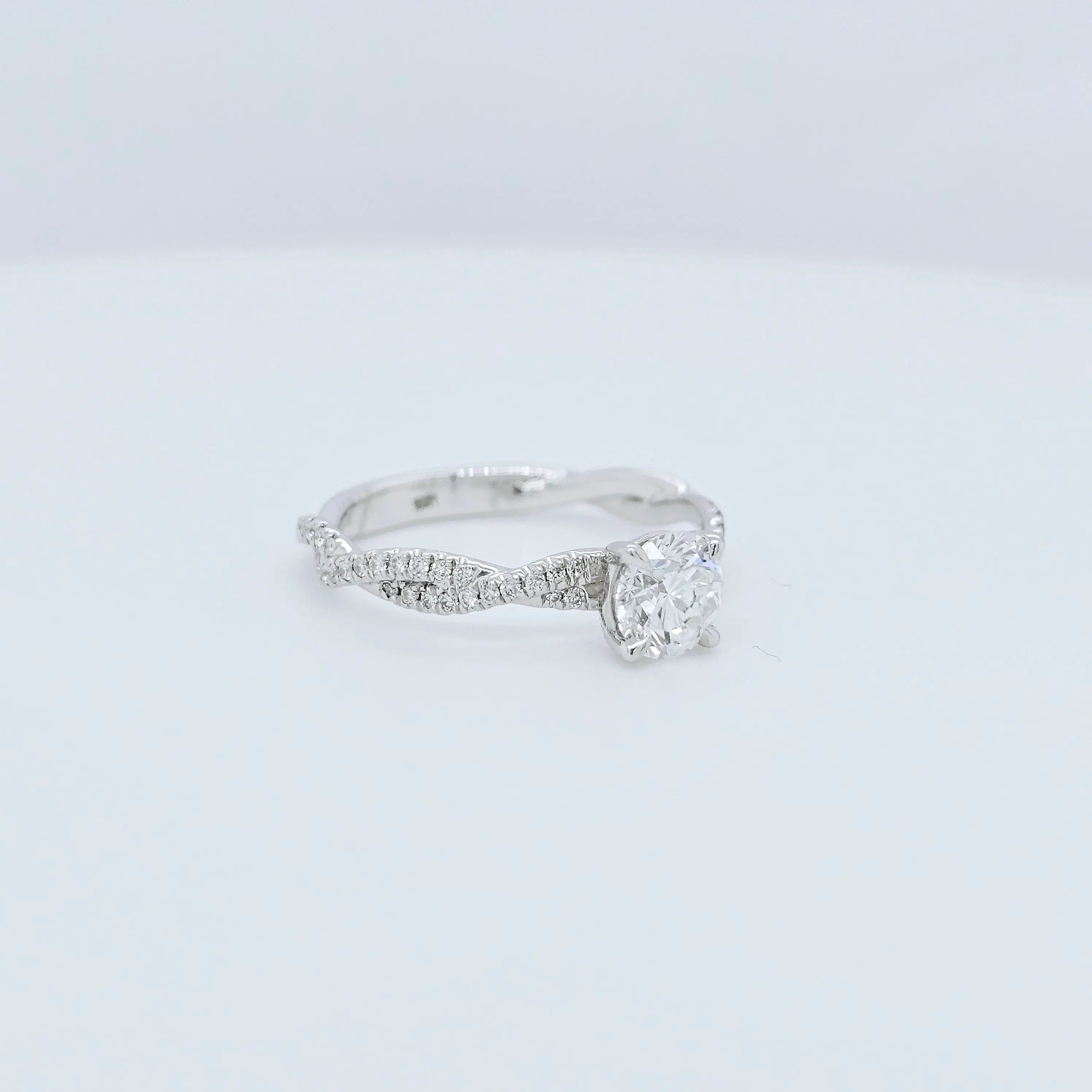Solitaire engagement ring | Twisted band engagement ring | 18k white gold wedding ring Chloe's Jewellers