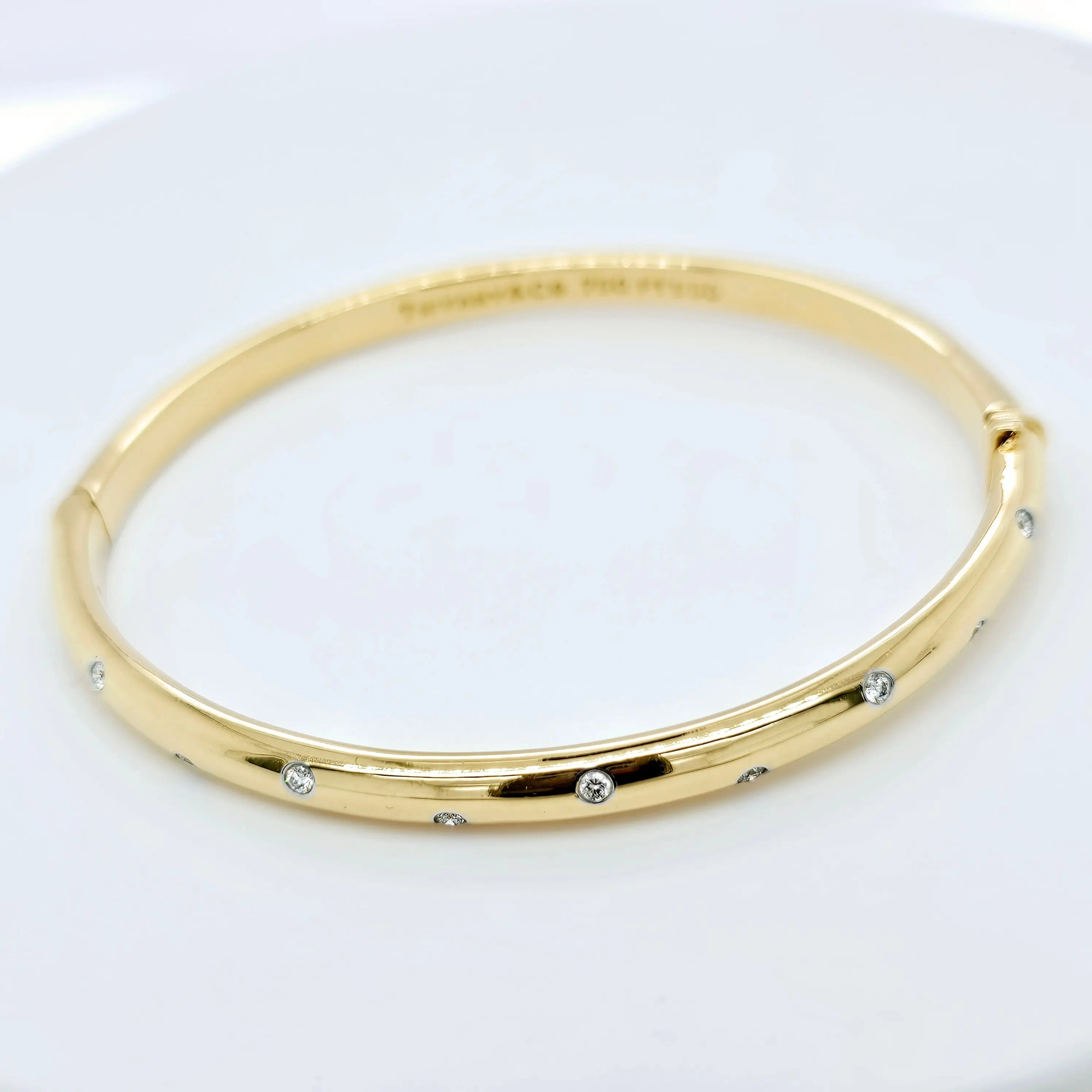 Pre-Owned | Tiffany & Co 18ct Yellow Gold and Diamond Etoile Bangle Chloe's Jewellers