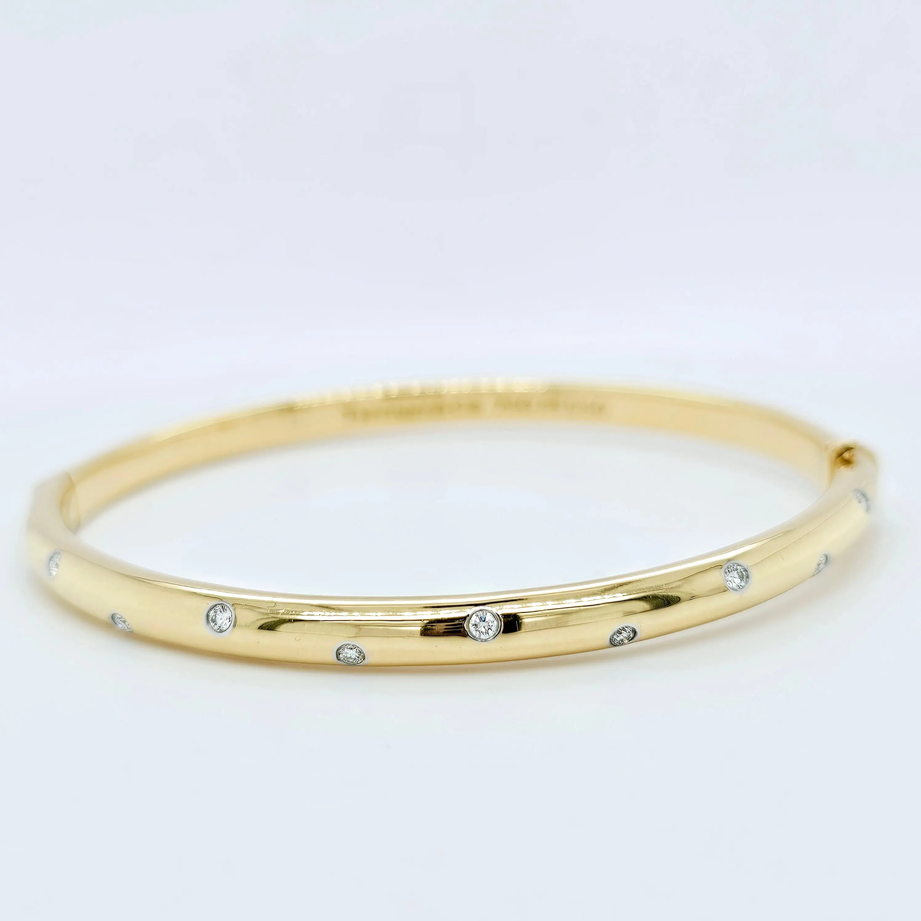 Pre-Owned | Tiffany & Co 18ct Yellow Gold and Diamond Etoile Bangle Chloe's Jewellers