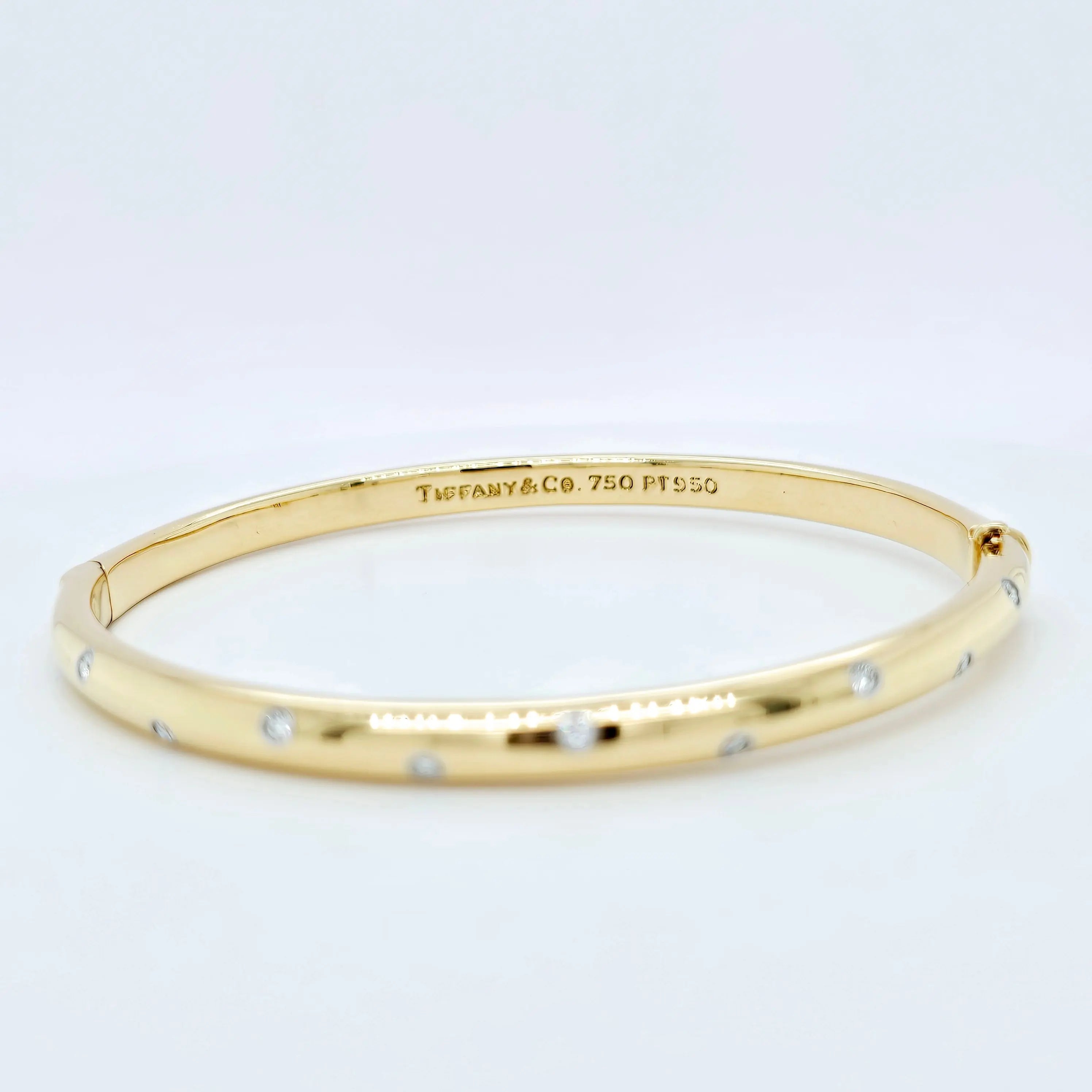 Pre-Owned | Tiffany & Co 18ct Yellow Gold and Diamond Etoile Bangle Chloe's Jewellers