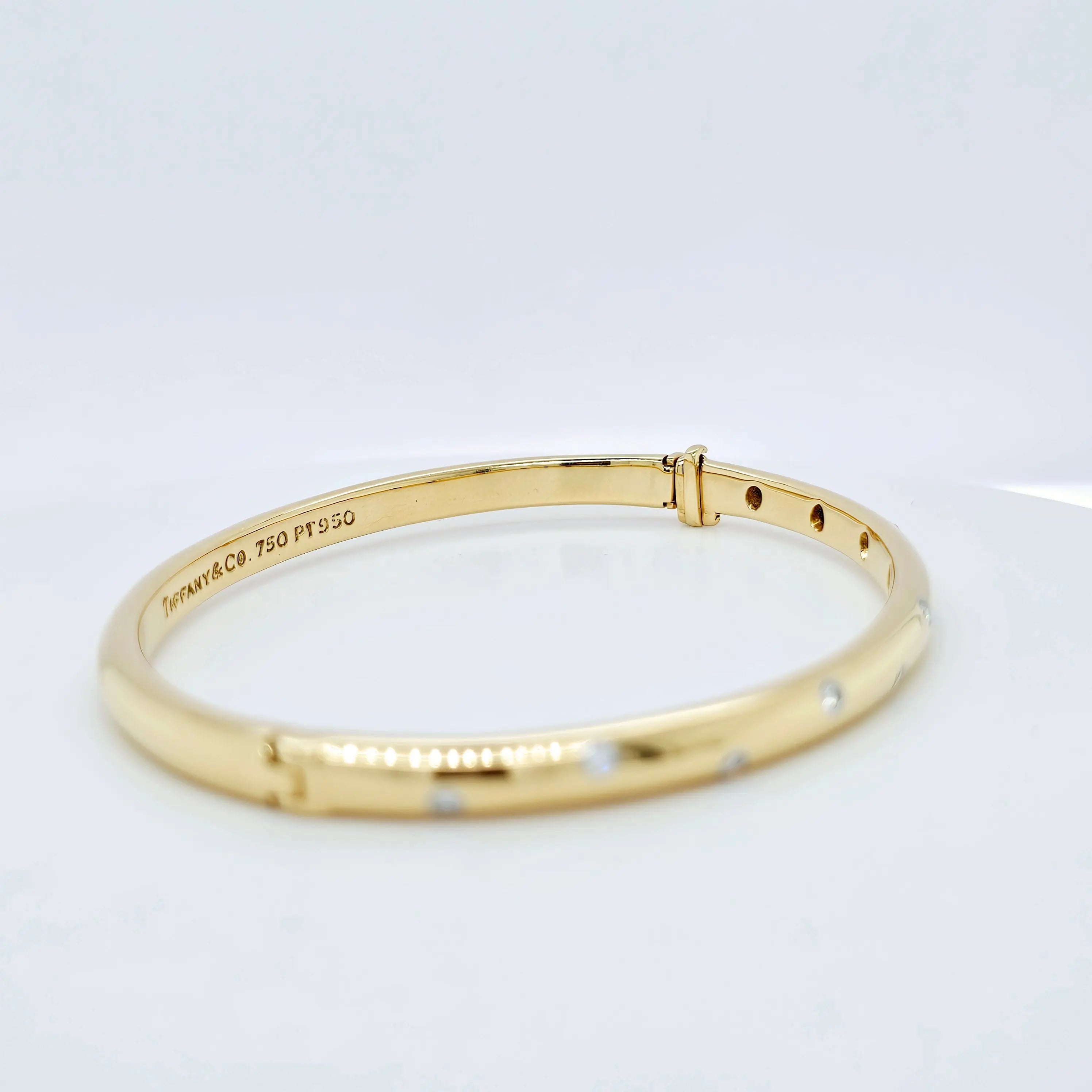 Pre-Owned | Tiffany & Co 18ct Yellow Gold and Diamond Etoile Bangle Chloe's Jewellers