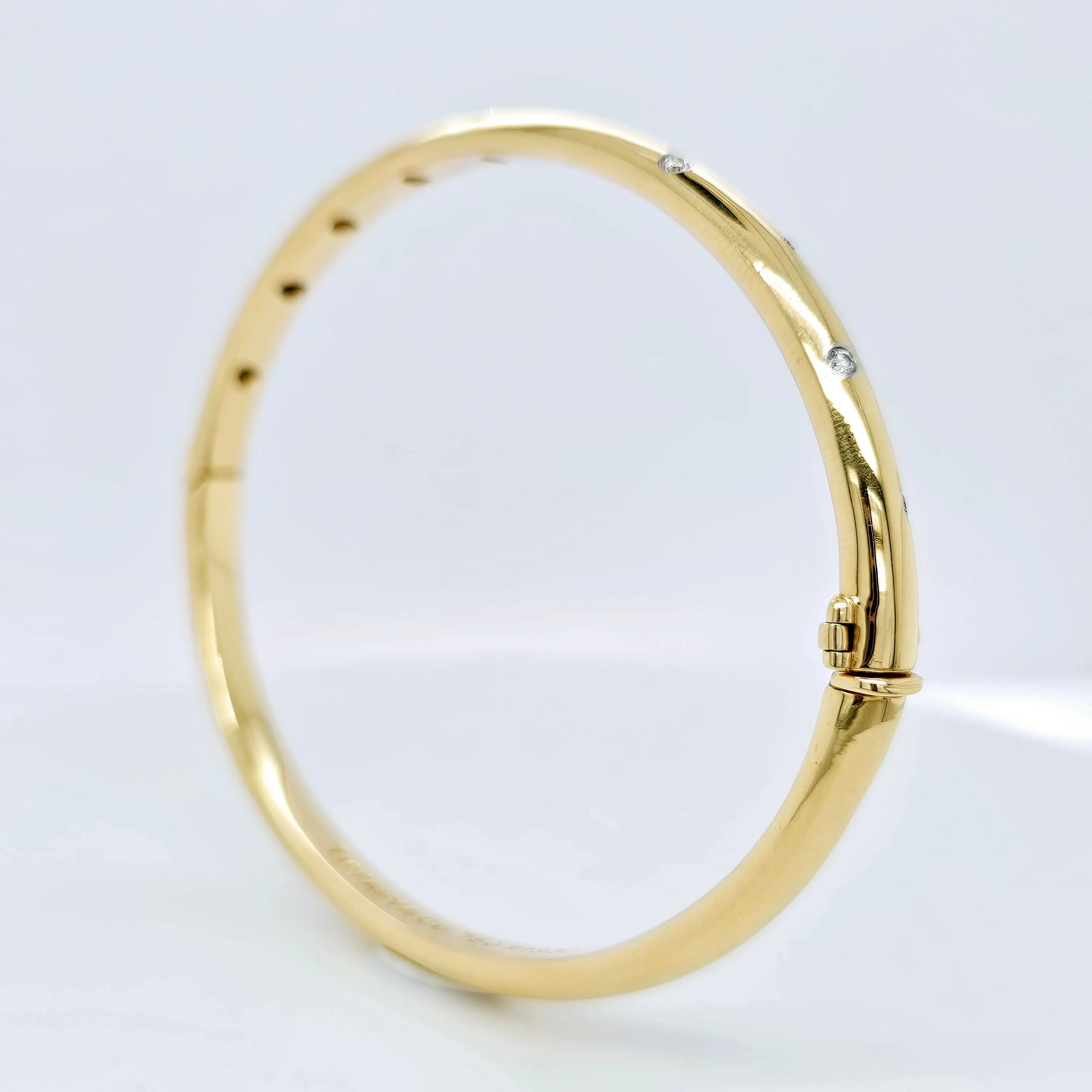 Pre-Owned | Tiffany & Co 18ct Yellow Gold and Diamond Etoile Bangle Chloe's Jewellers