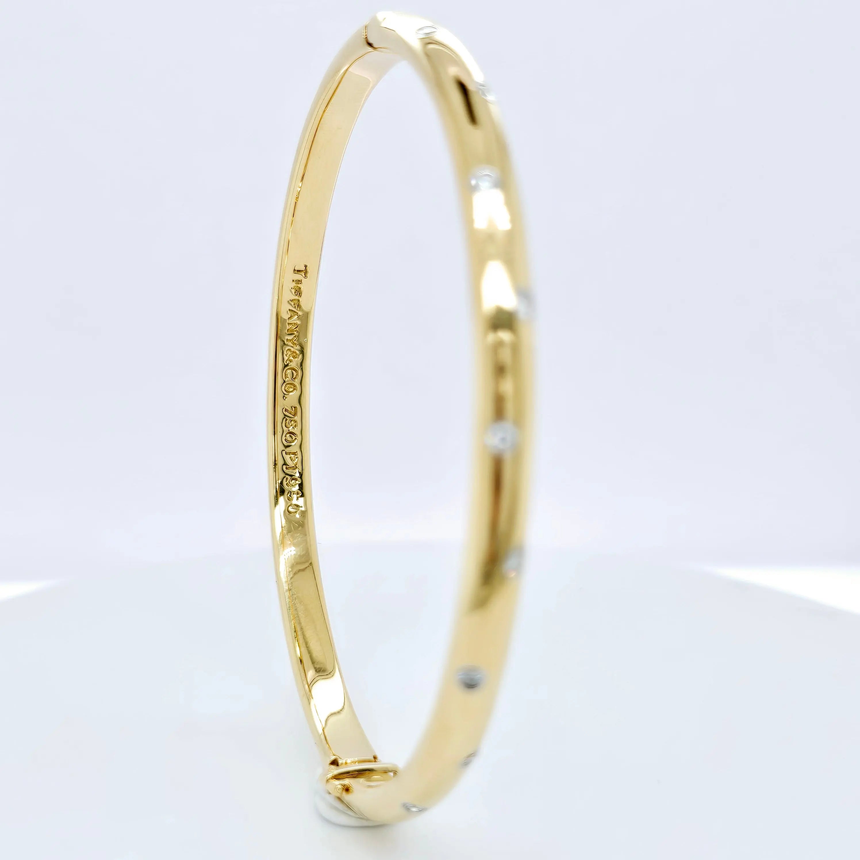 Pre-Owned | Tiffany & Co 18ct Yellow Gold and Diamond Etoile Bangle Chloe's Jewellers