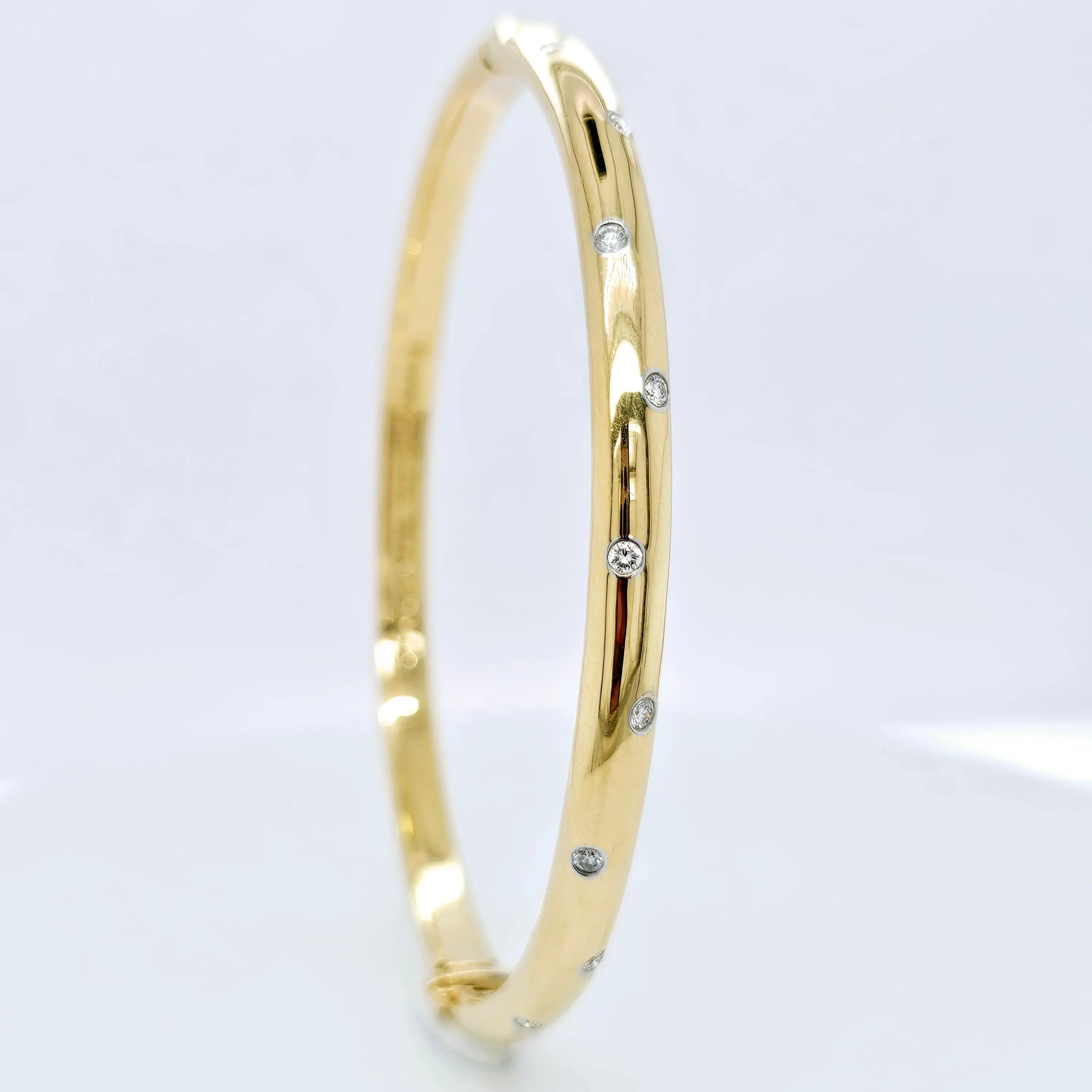 Pre-Owned | Tiffany & Co 18ct Yellow Gold and Diamond Etoile Bangle Chloe's Jewellers