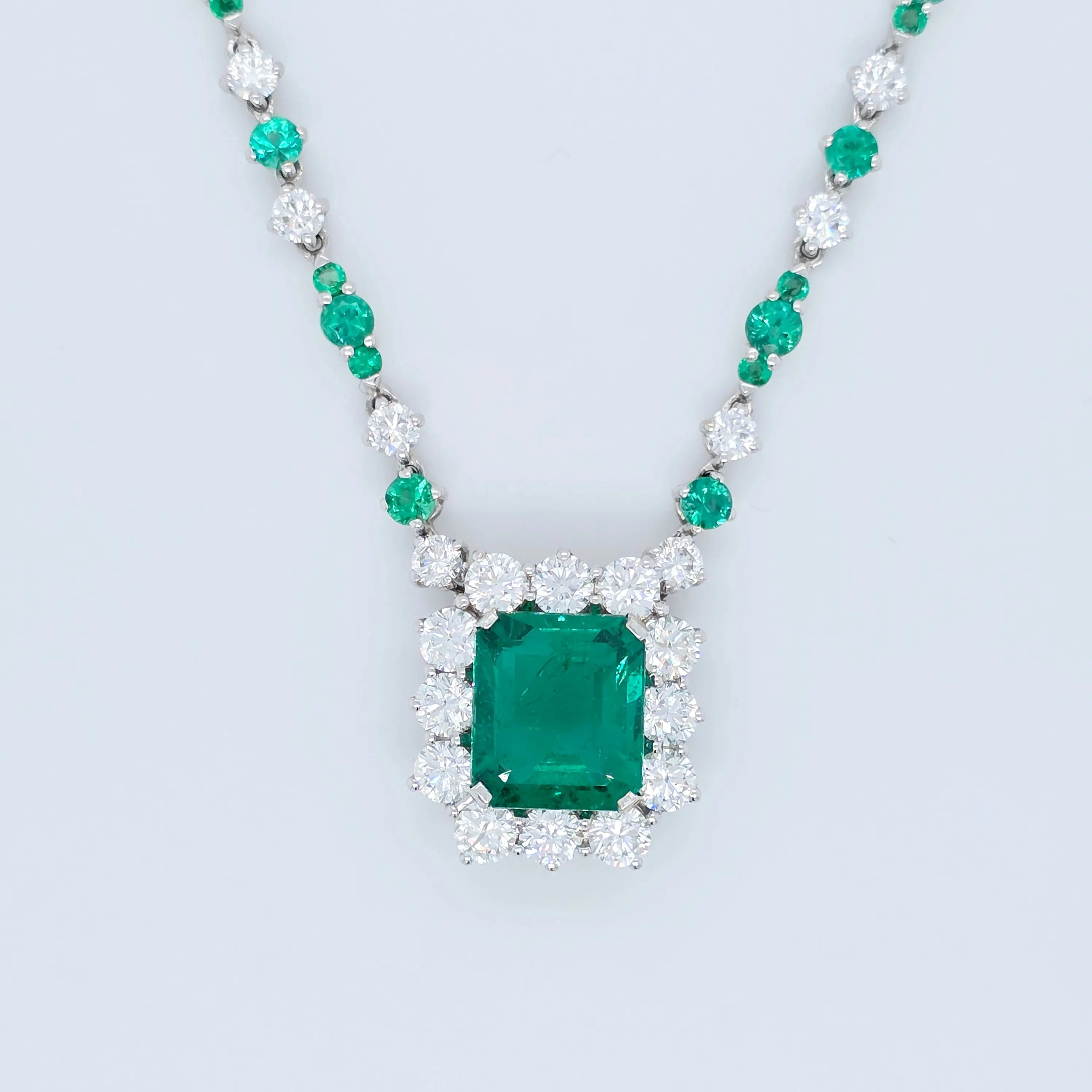 Antique emerald pendant necklace, Halo setting Chloe's Jewellers