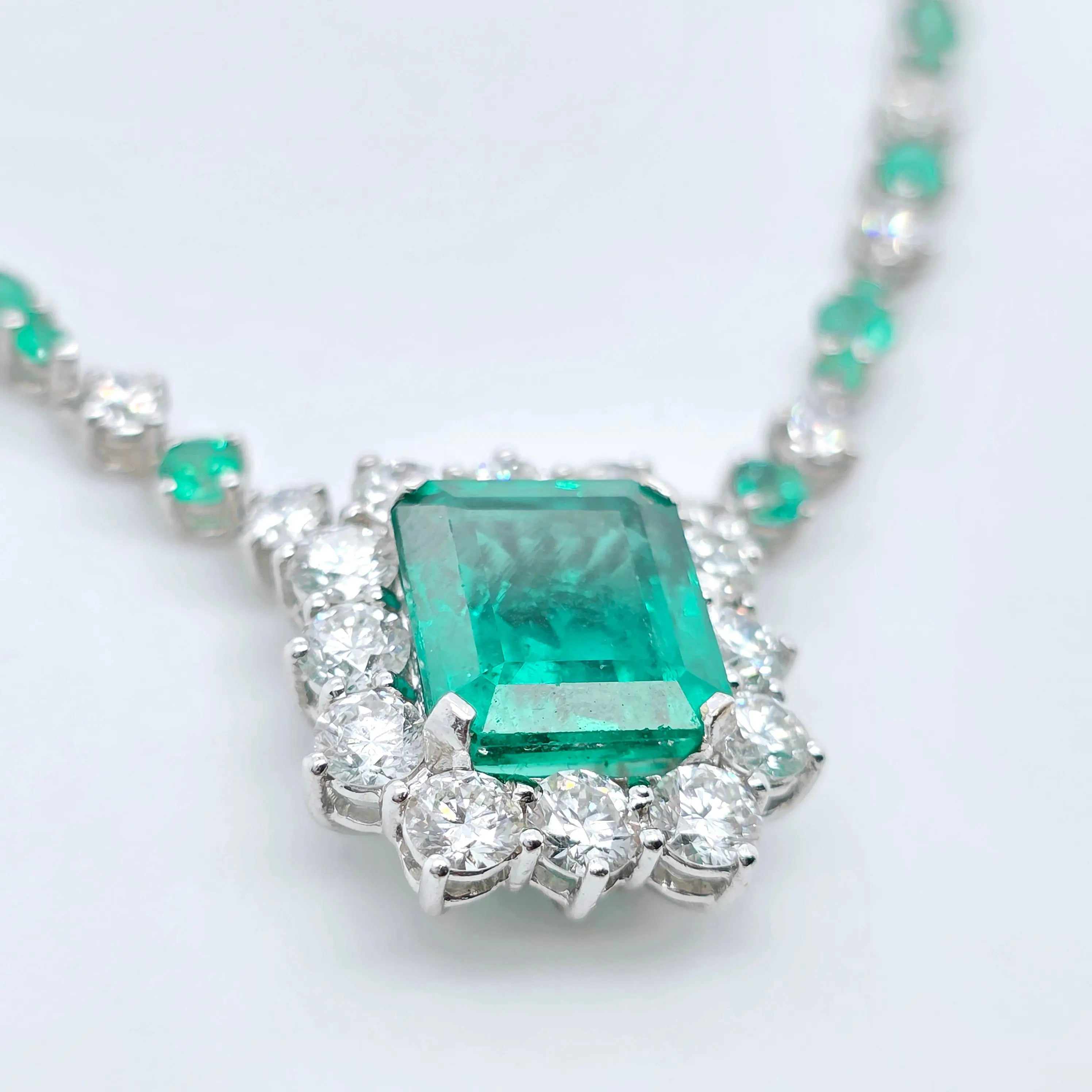 Antique emerald pendant necklace, Halo setting Chloe's Jewellers
