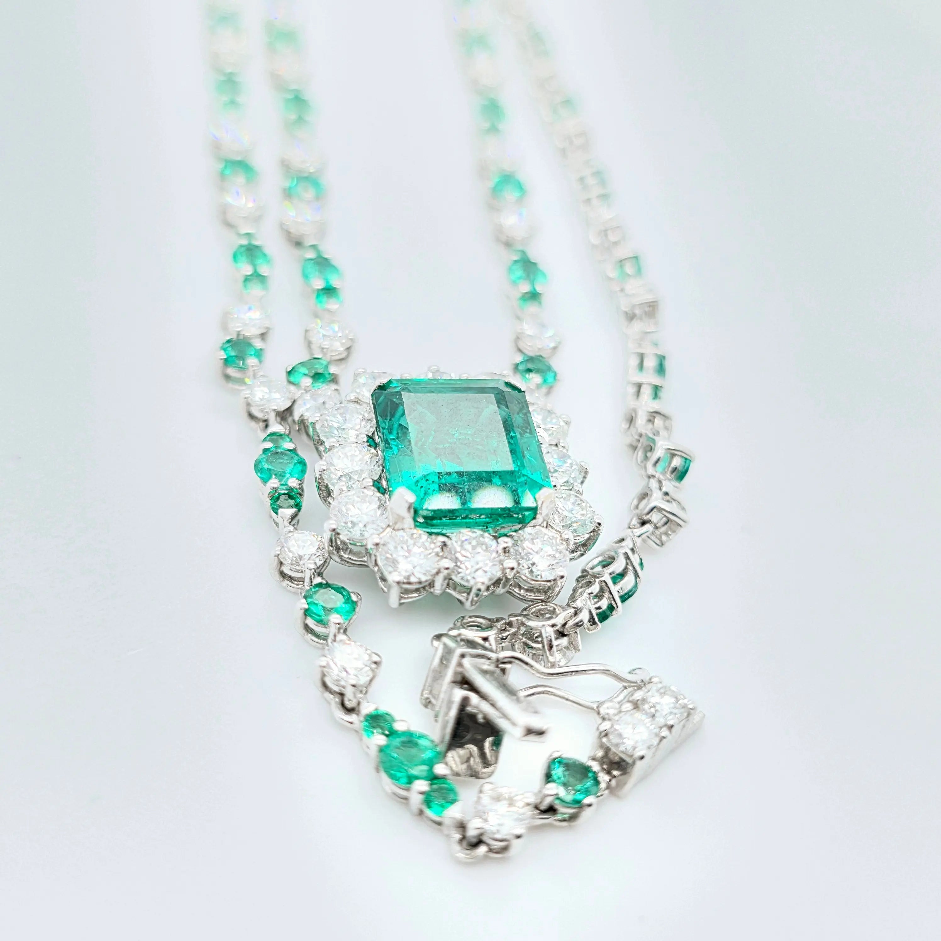 Antique emerald pendant necklace, Halo setting Chloe's Jewellers