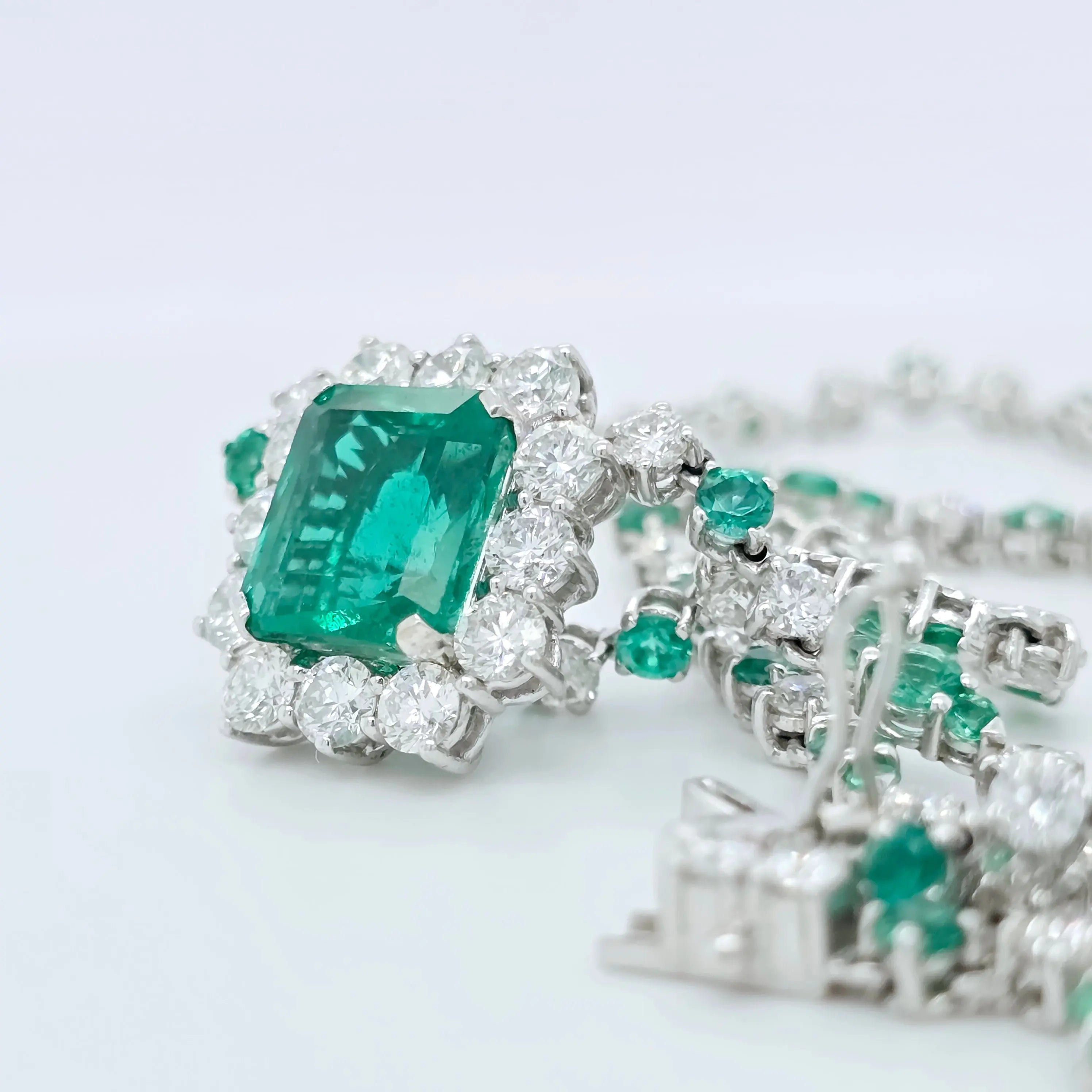 Antique emerald pendant necklace, Halo setting Chloe's Jewellers