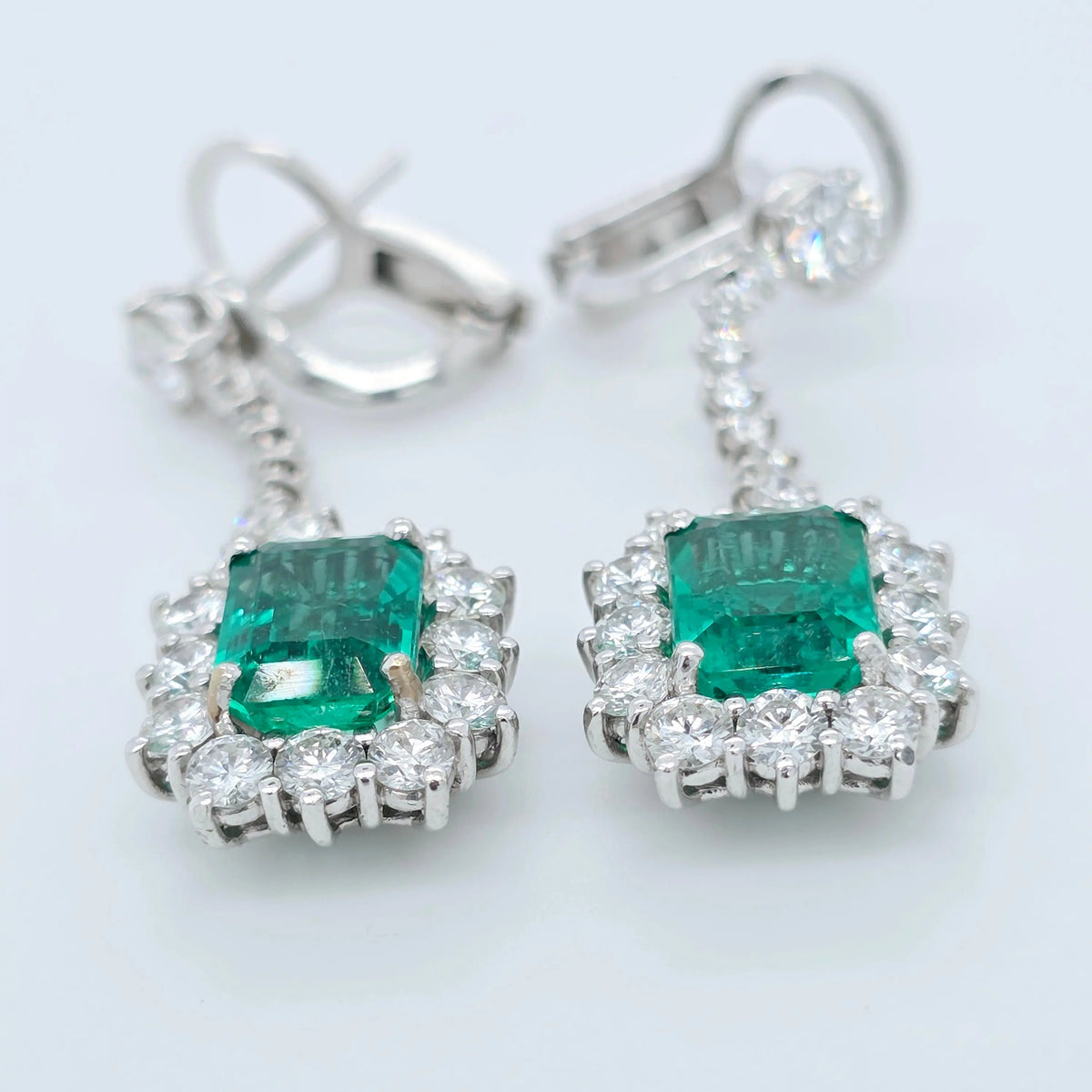 Antique emerald earrings, Halo setting drop earrings Chloe's Jewellers