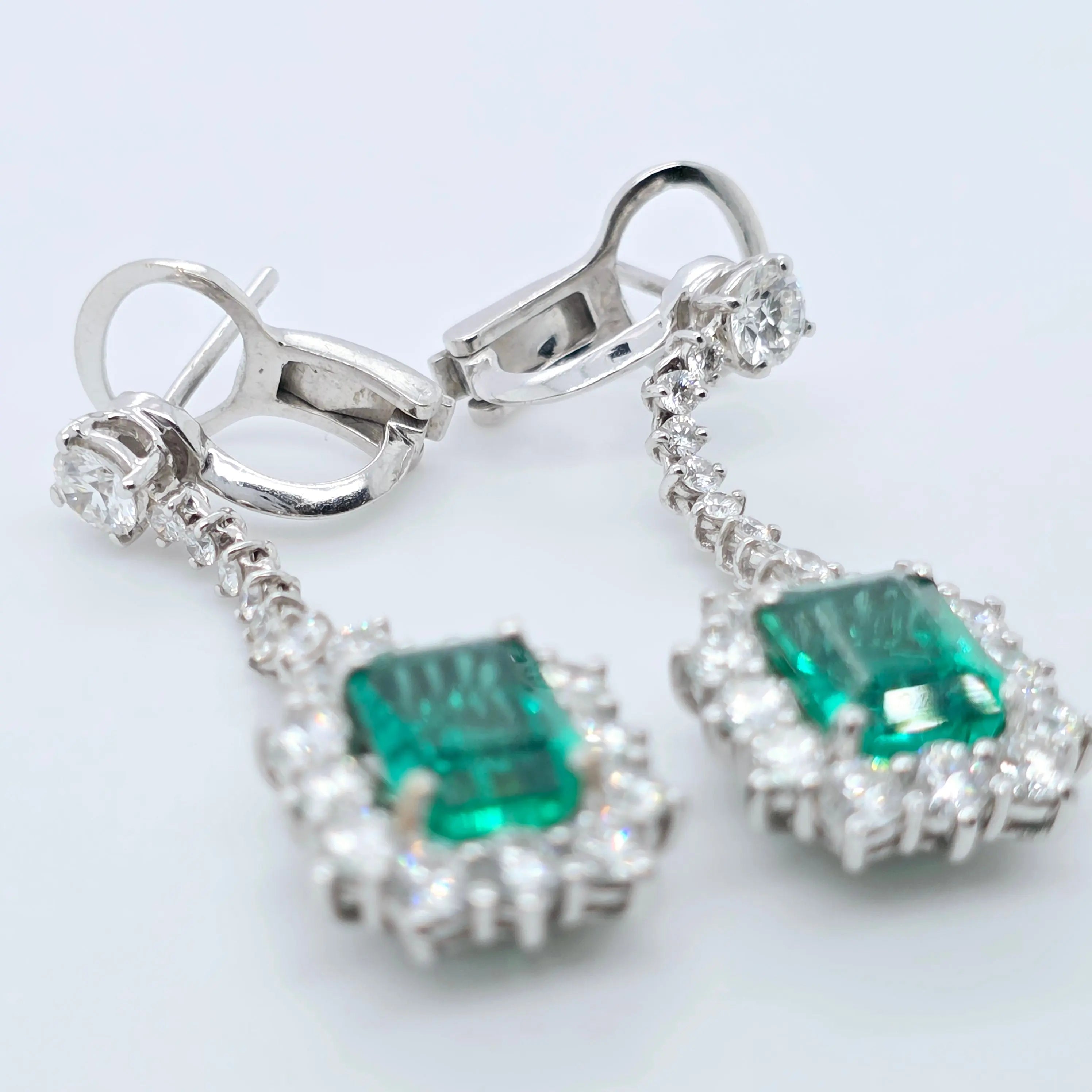 Antique emerald earrings, Halo setting drop earrings Chloe's Jewellers