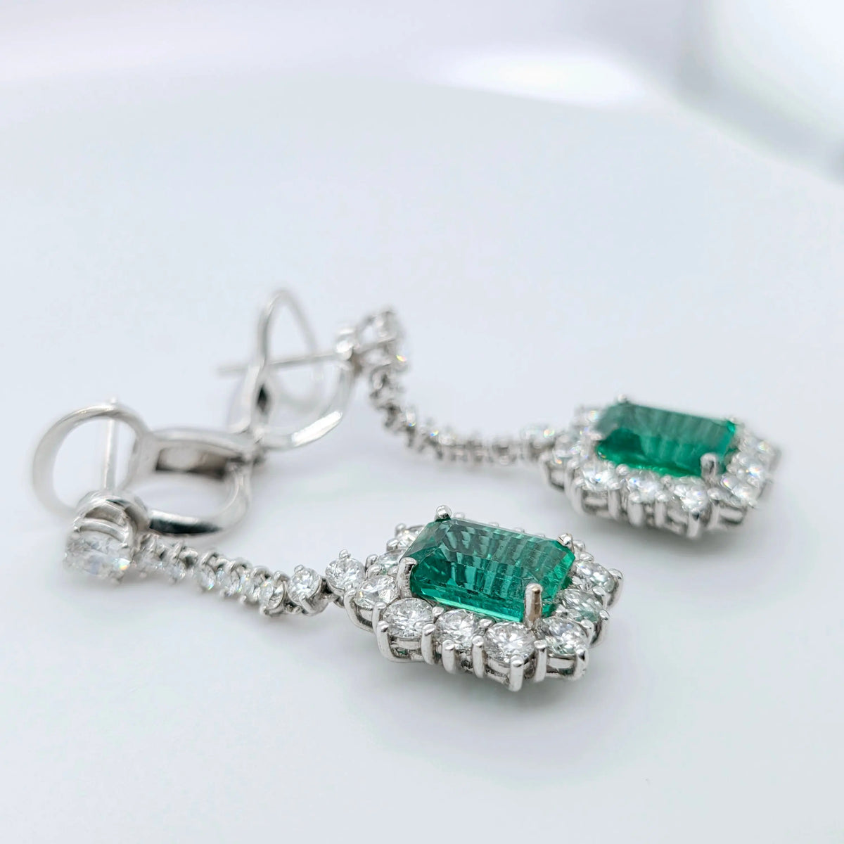 Antique emerald earrings, Halo setting drop earrings Chloe's Jewellers