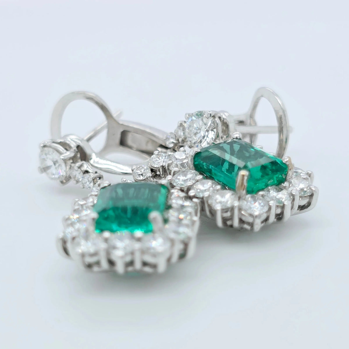 Antique emerald earrings, Halo setting drop earrings Chloe's Jewellers