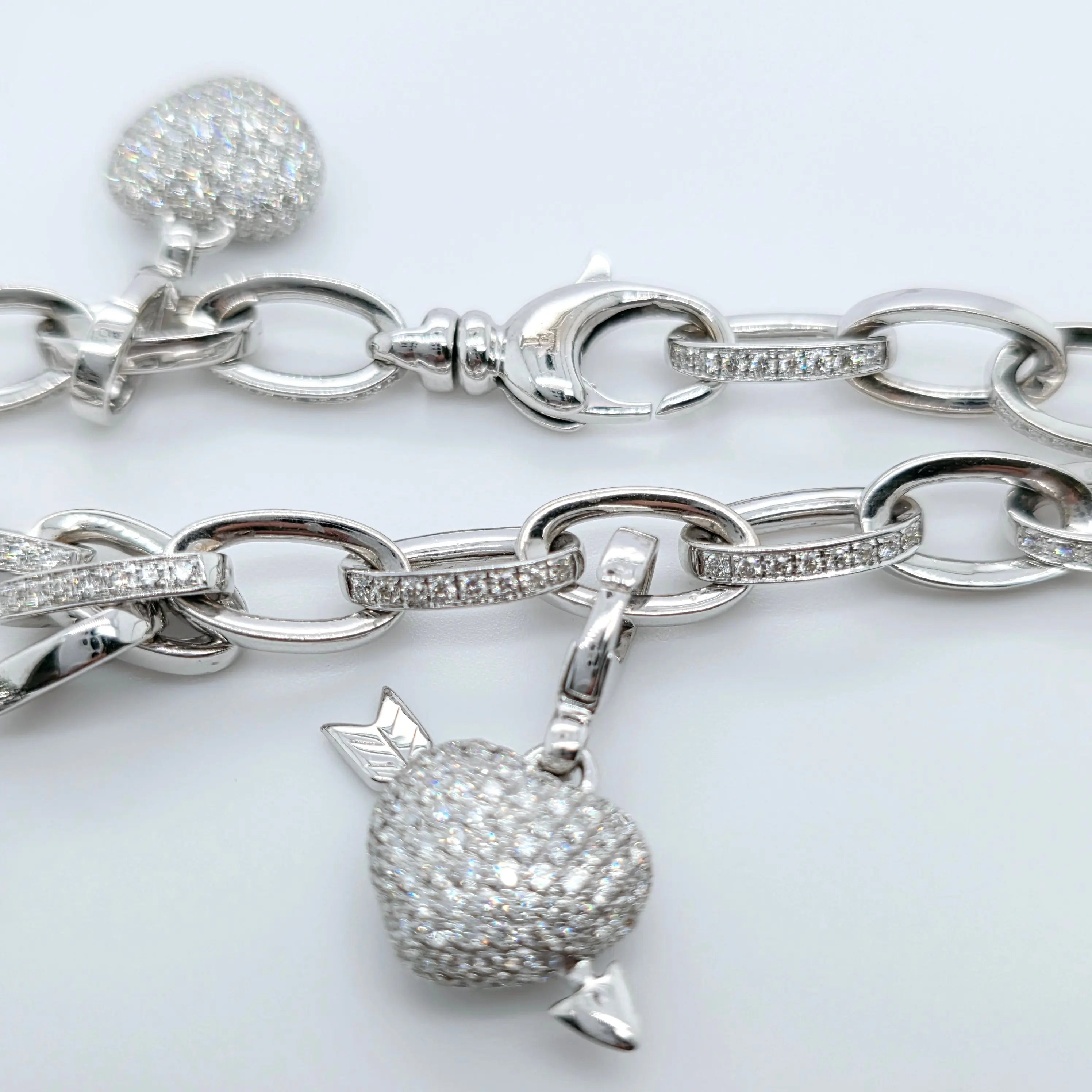 Pre-Owned Theo Fennell Diamond Charm Bracelet | 18K White Gold, 4 Charms Chloe's Jewellers