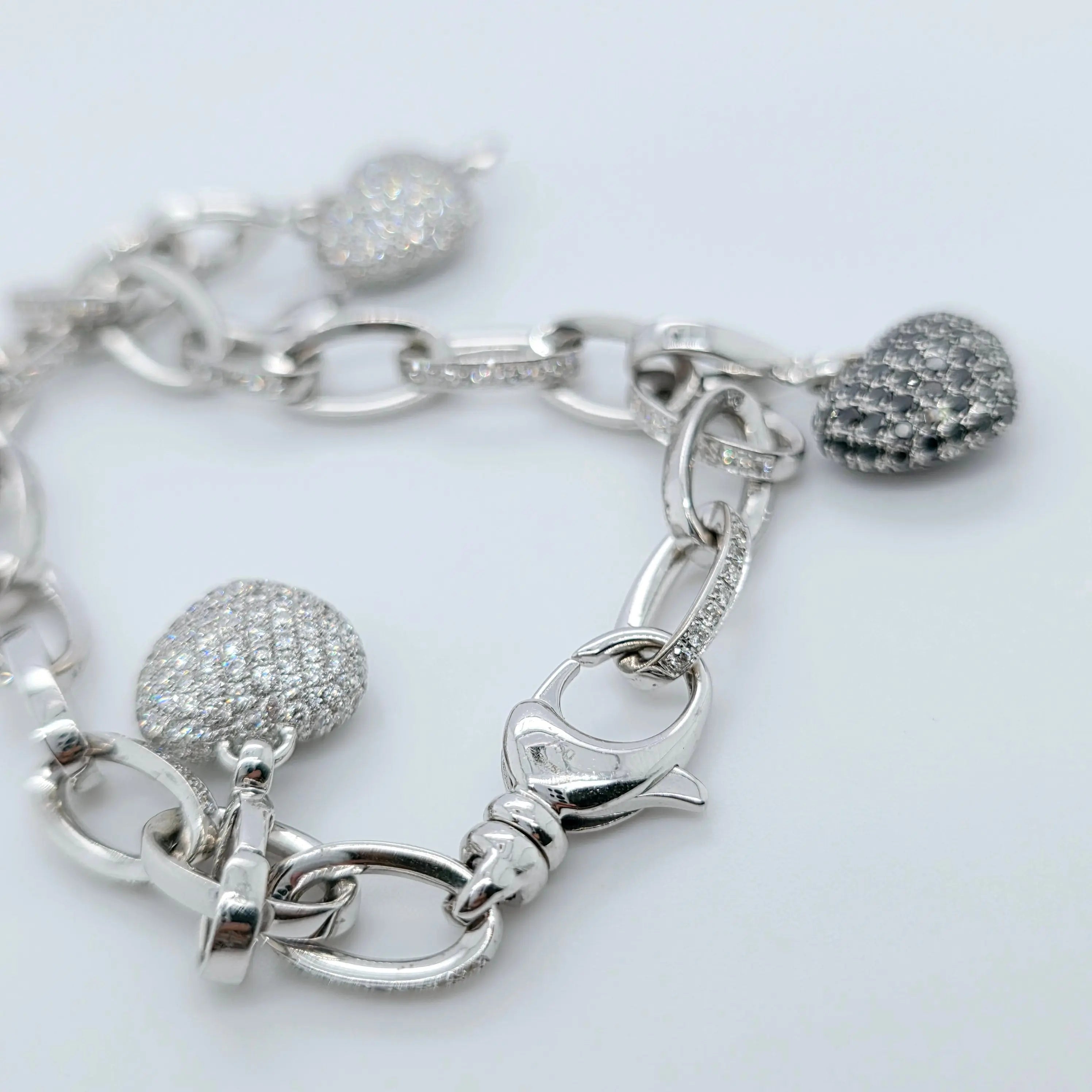 Pre-Owned Theo Fennell Diamond Charm Bracelet | 18K White Gold, 4 Charms Chloe's Jewellers