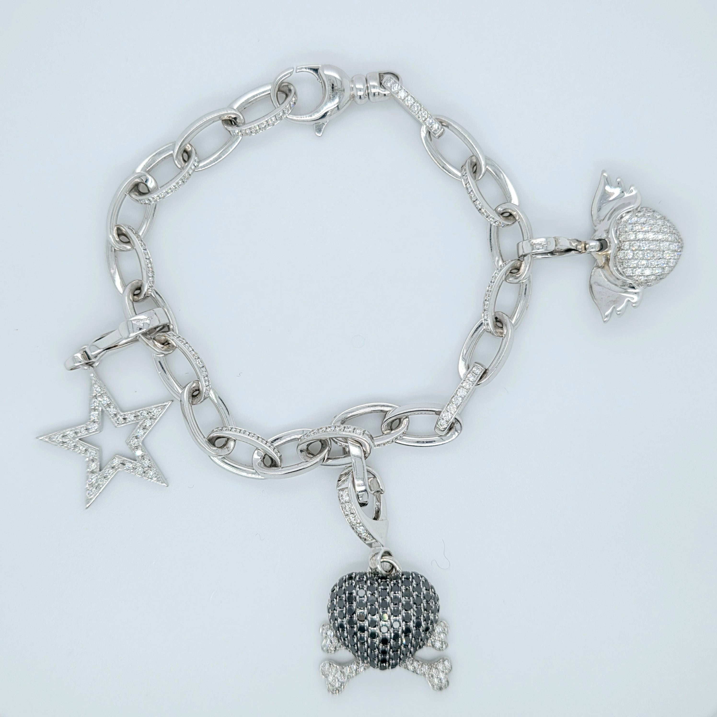 Pre-Owned Theo Fennell Diamond Charm Bracelet | 18K Gold, 3 Charms Chloe's Jewellers