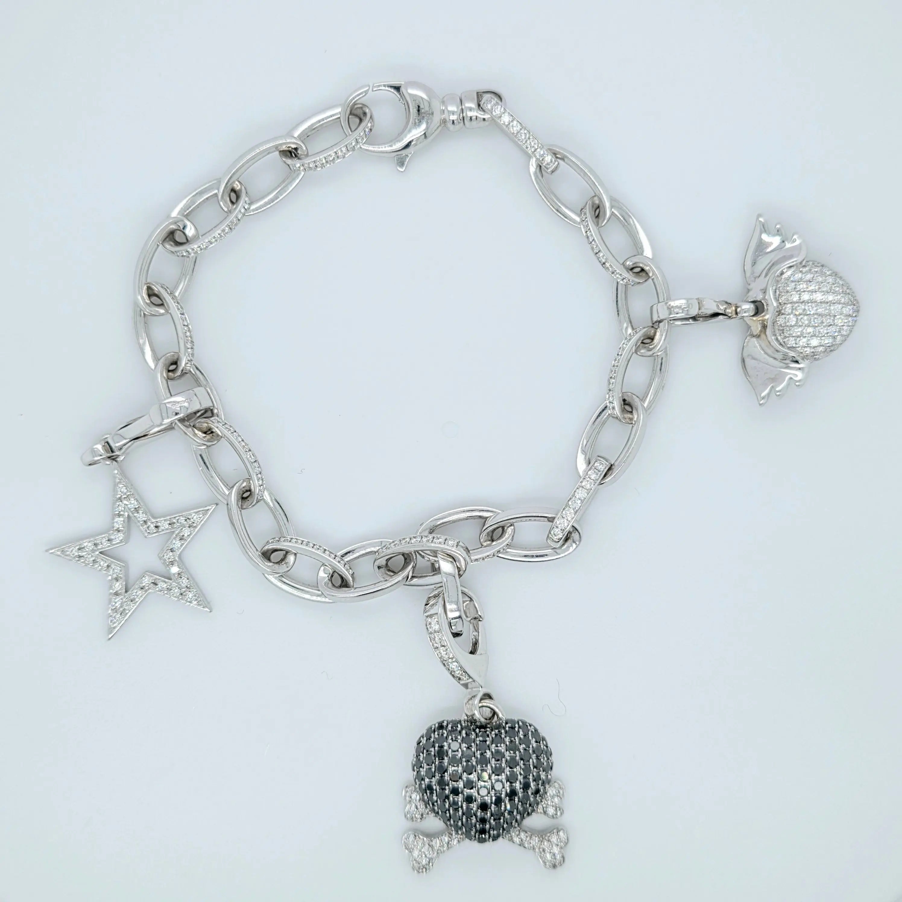 Pre-Owned Theo Fennell Diamond Charm Bracelet | 18K Gold, 3 Charms Chloe's Jewellers