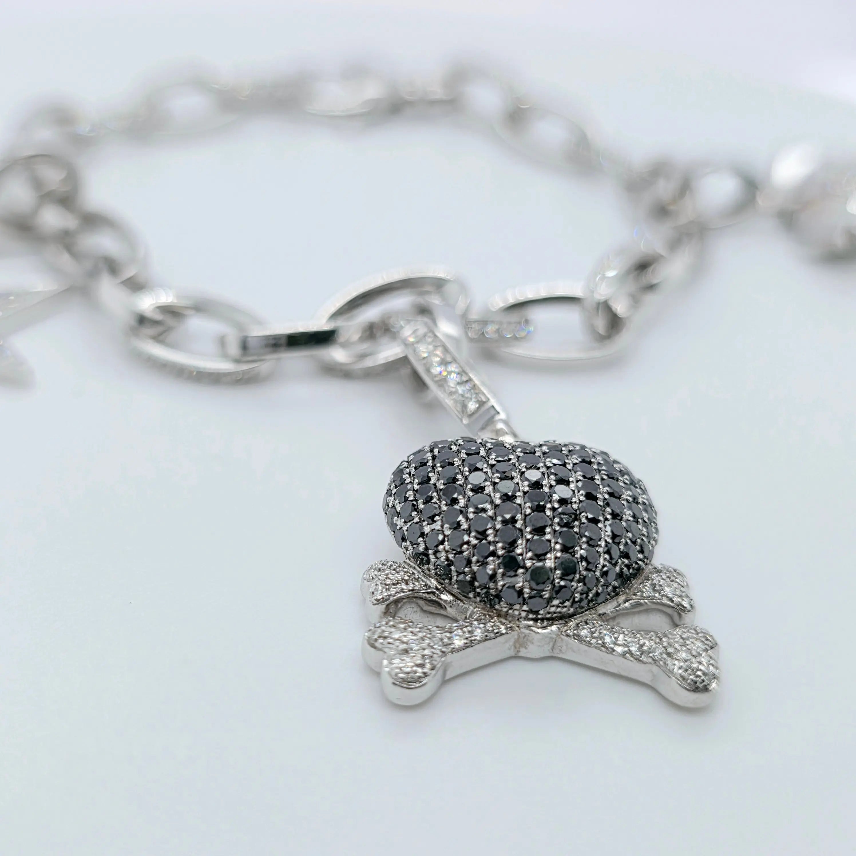 Pre-Owned Theo Fennell Diamond Charm Bracelet | 18K Gold, 3 Charms Chloe's Jewellers