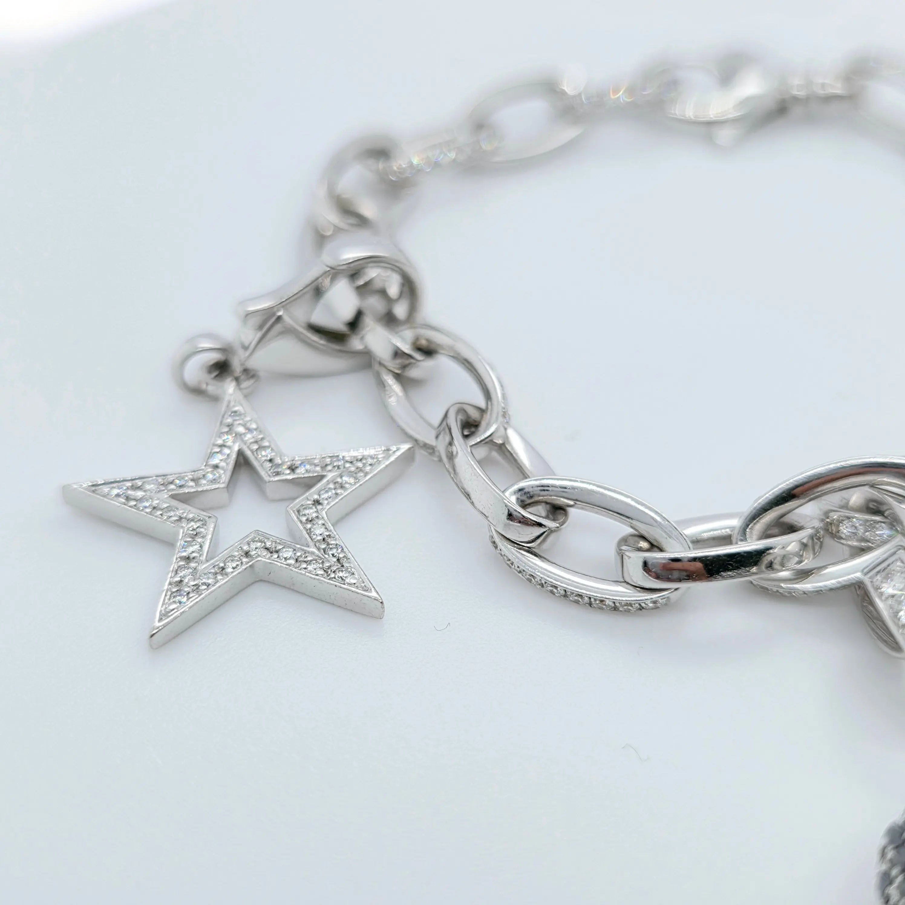 Pre-Owned Theo Fennell Diamond Charm Bracelet | 18K Gold, 3 Charms Chloe's Jewellers