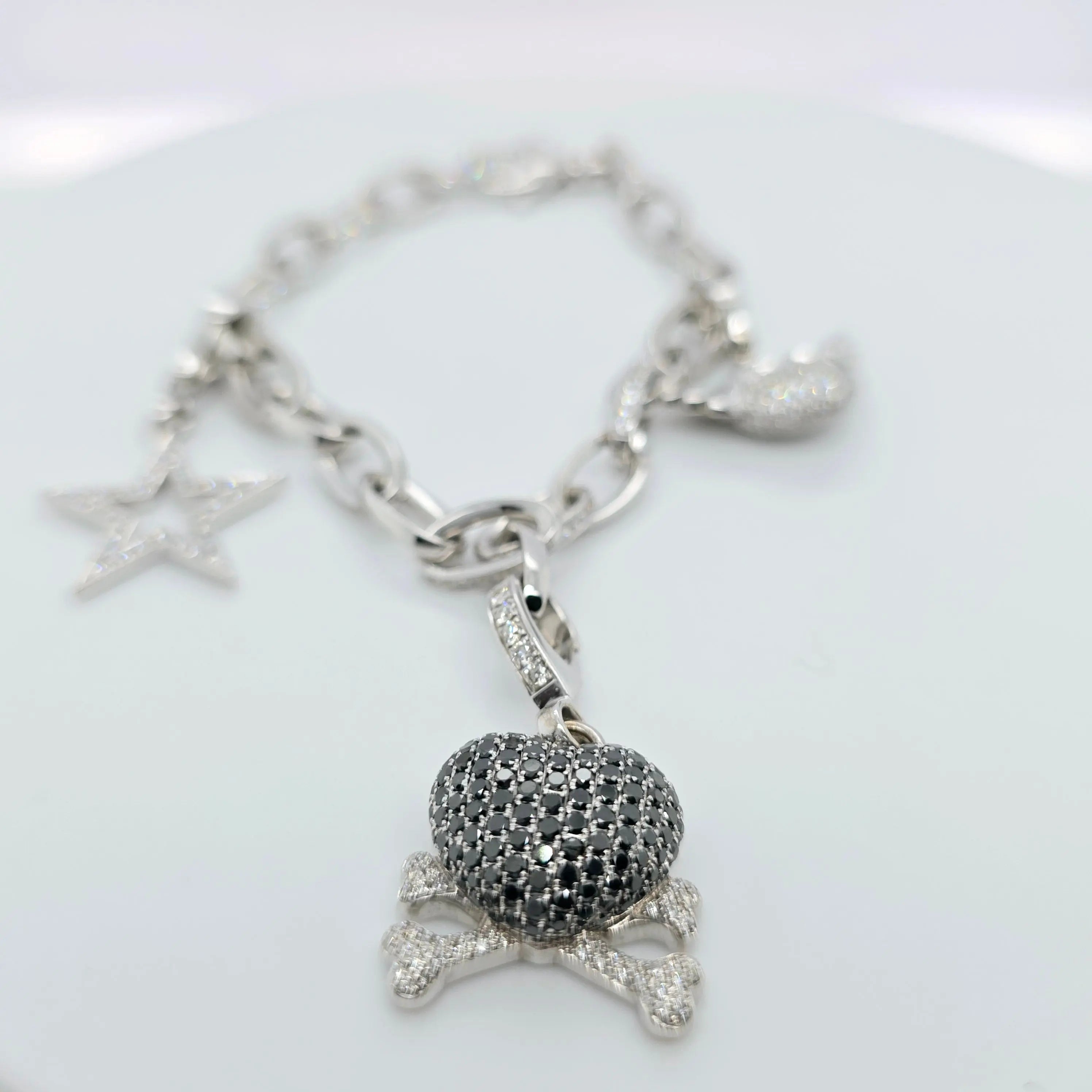 Pre-Owned Theo Fennell Diamond Charm Bracelet | 18K Gold, 3 Charms Chloe's Jewellers