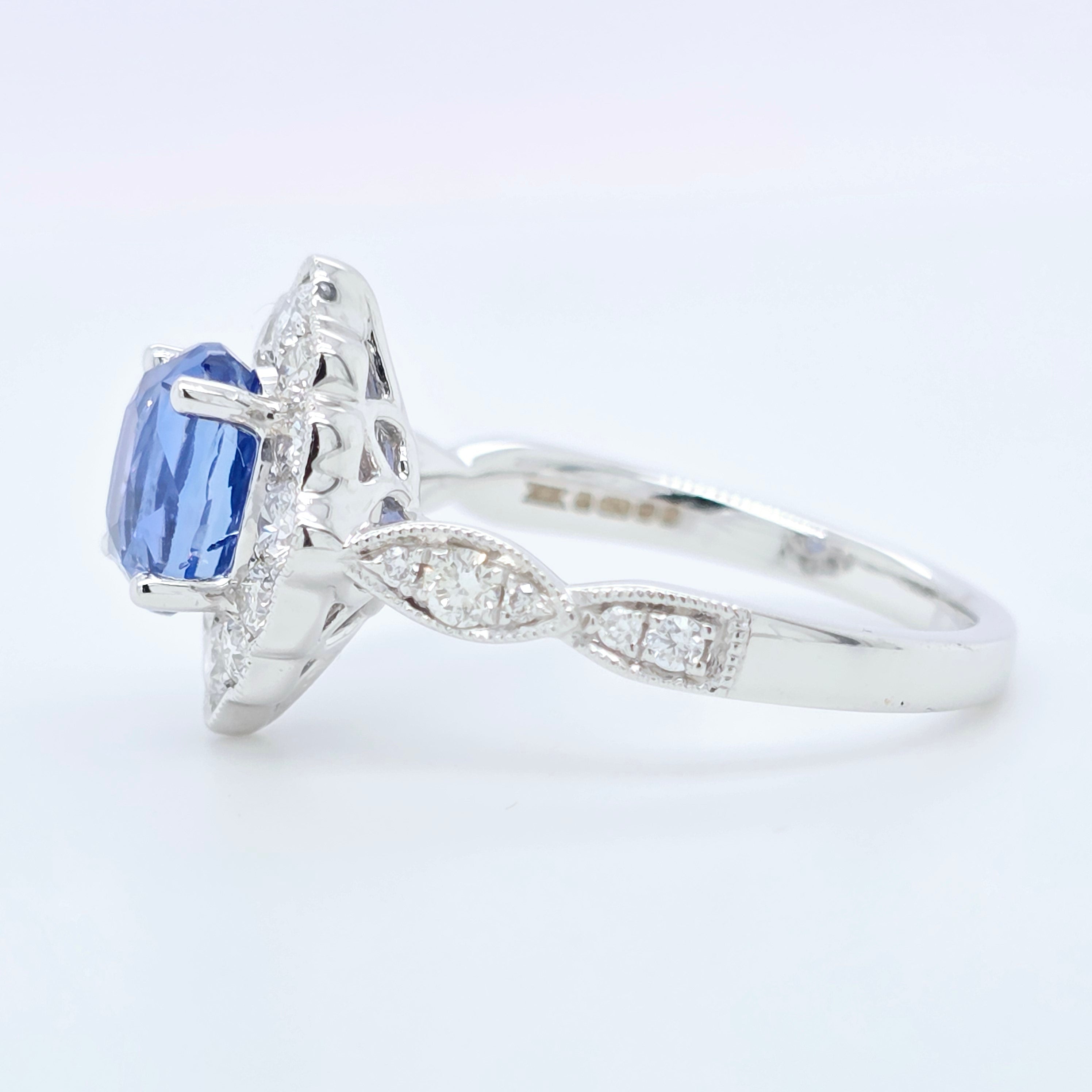 2.02ct Blue Sapphire Ring – Oval Halo, 18K Gold, F VS1 Diamonds Chloe's Jewellers
