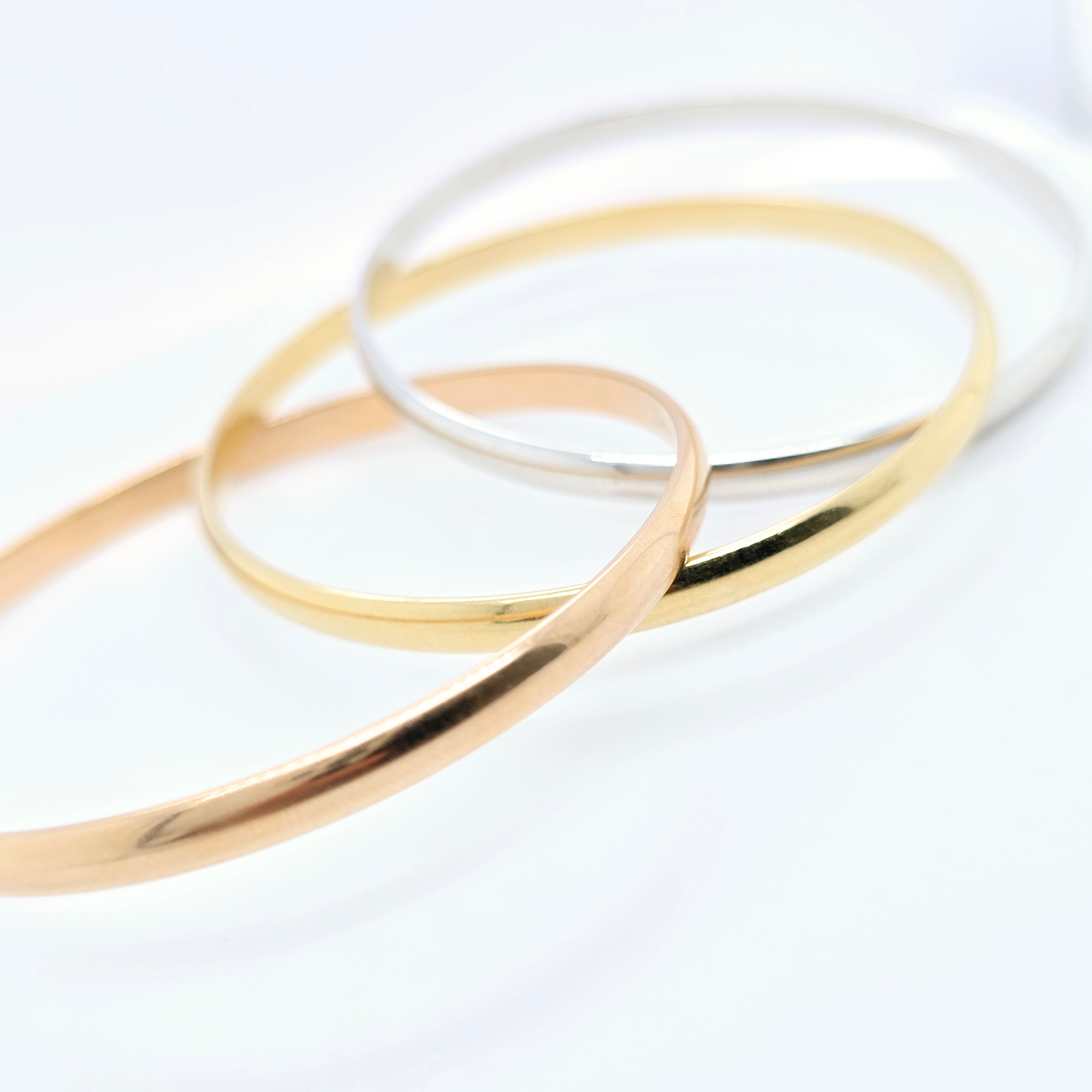 Pre-Owned Cartier Trinity Bangle | 18K Tri-Color Gold, Size 17cm Chloe's Jewellers