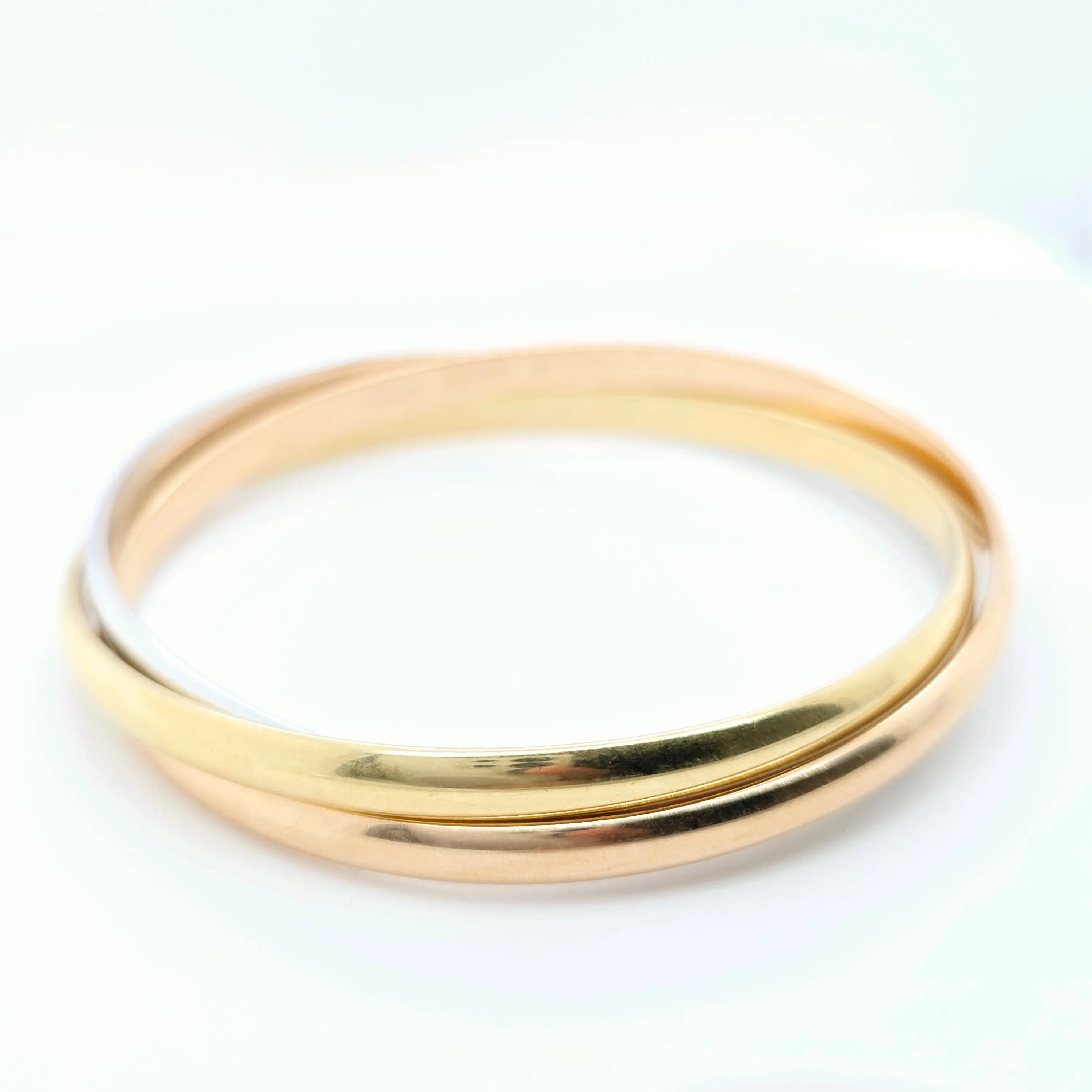 Pre-Owned Cartier Trinity Bangle | 18K Tri-Color Gold, Size 17cm Chloe's Jewellers