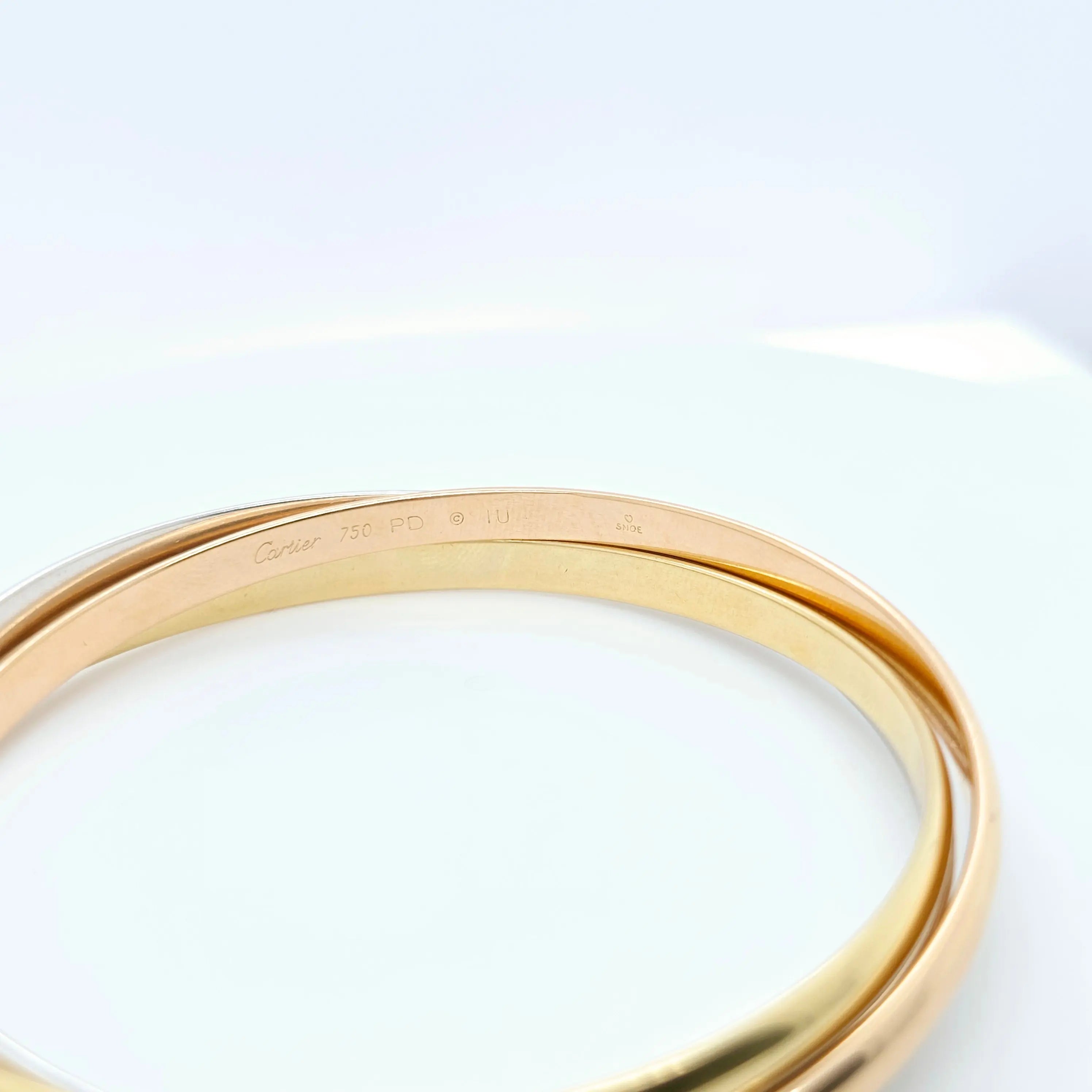 Pre-Owned Cartier Trinity Bangle | 18K Tri-Color Gold, Size 17cm Chloe's Jewellers