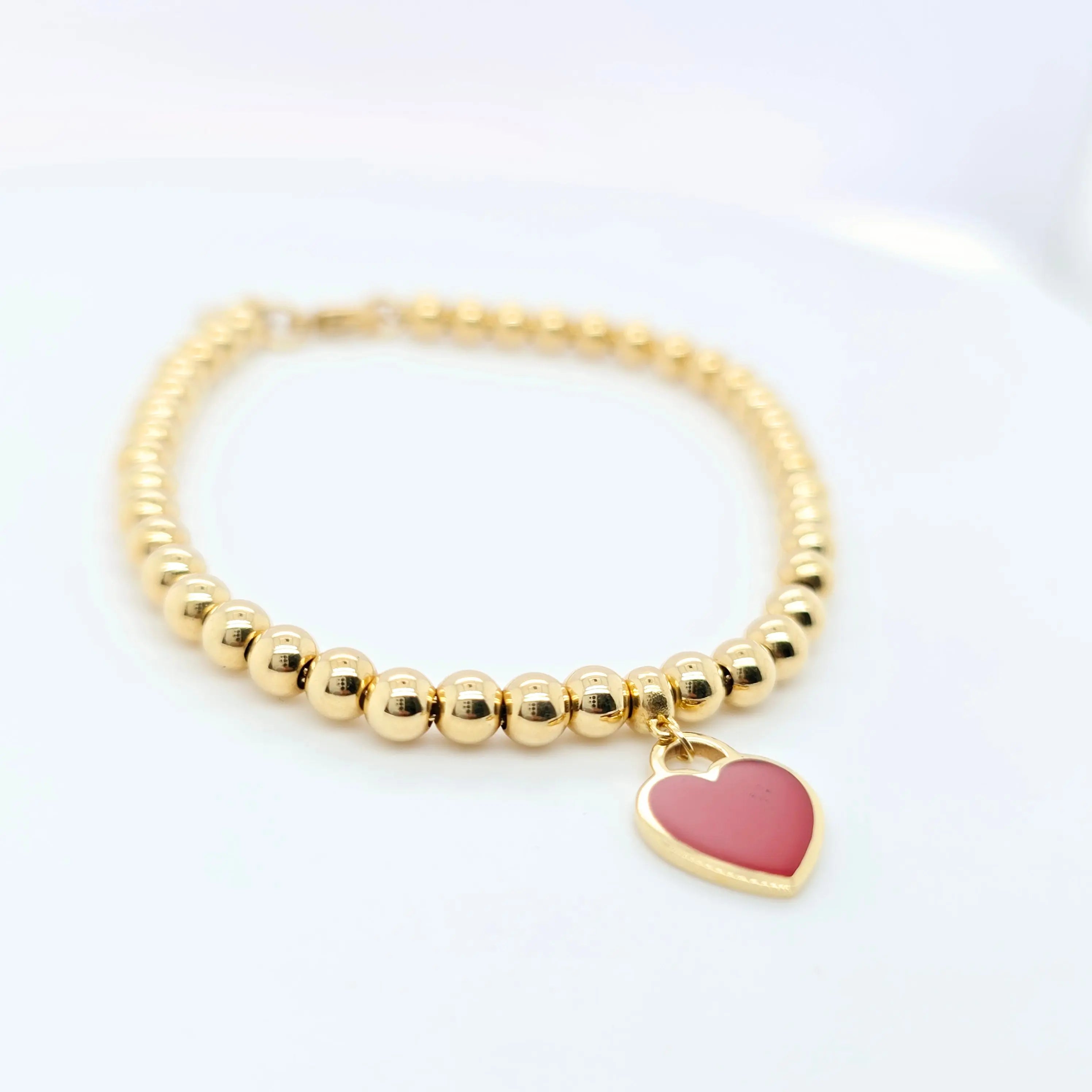 Tiffany & Co. Mini Heart Tag Bead Bracelet | 18K Gold | Red Enamel Chloe's Jewellers