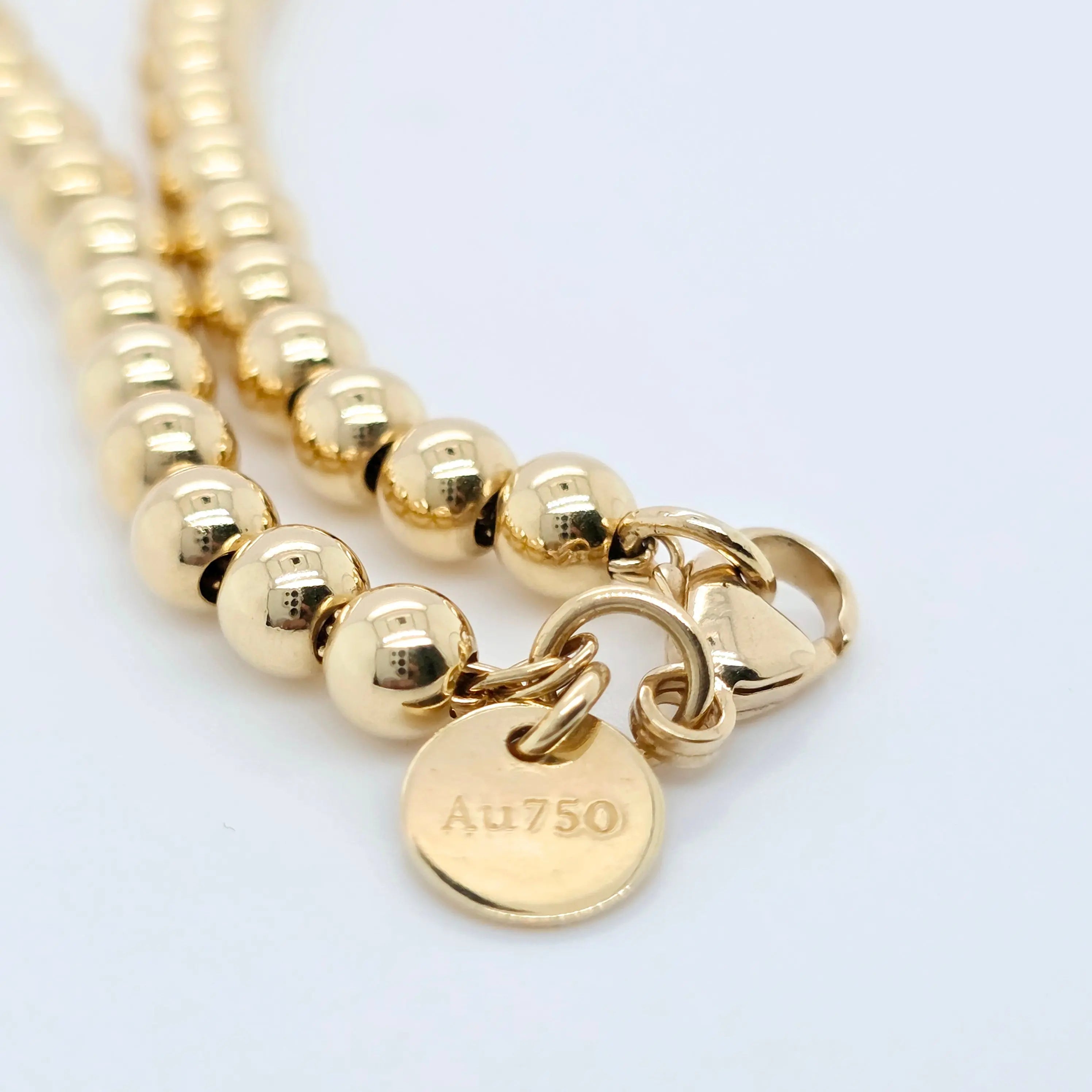 Tiffany & Co. Mini Heart Tag Bead Bracelet | 18K Gold | Red Enamel Chloe's Jewellers