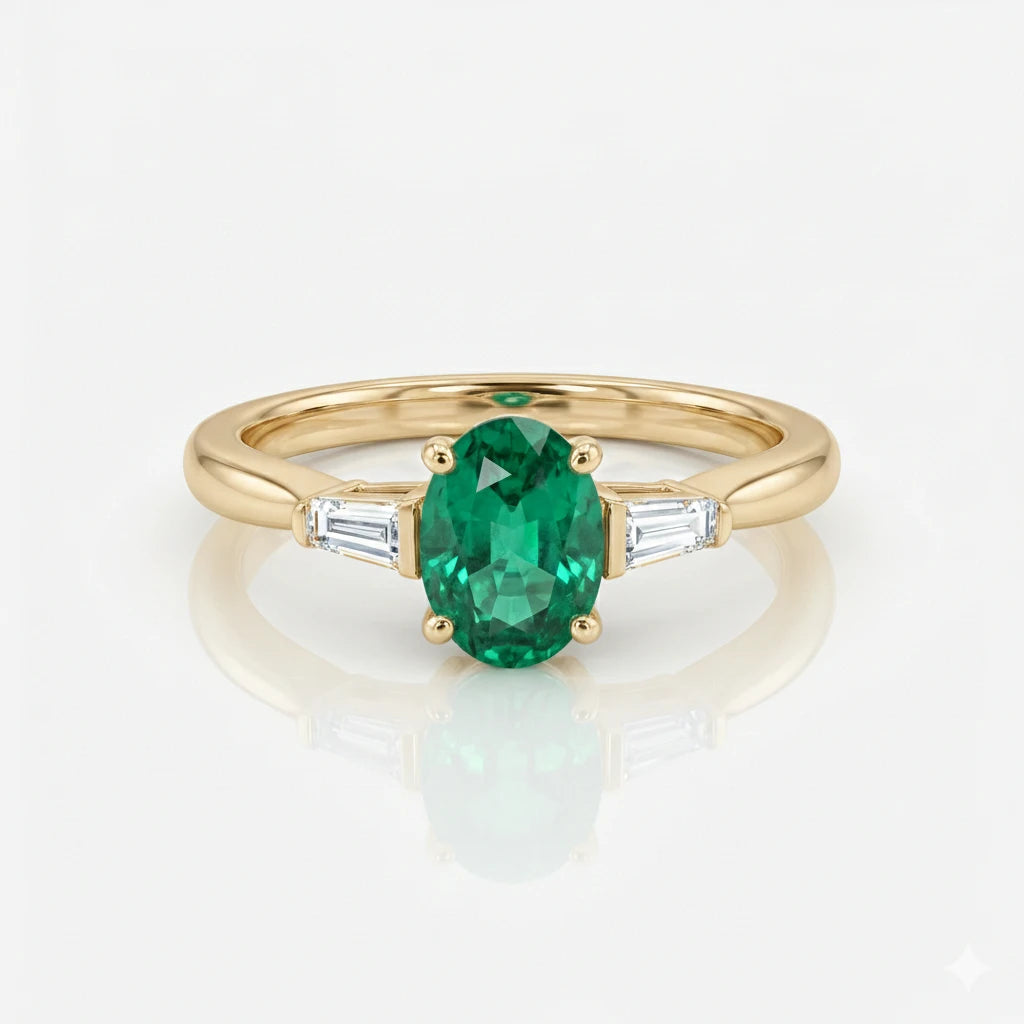 0.60ct Oval Cut Emerald Engagement Ring with Two Side Stones Chloe's Jewellers