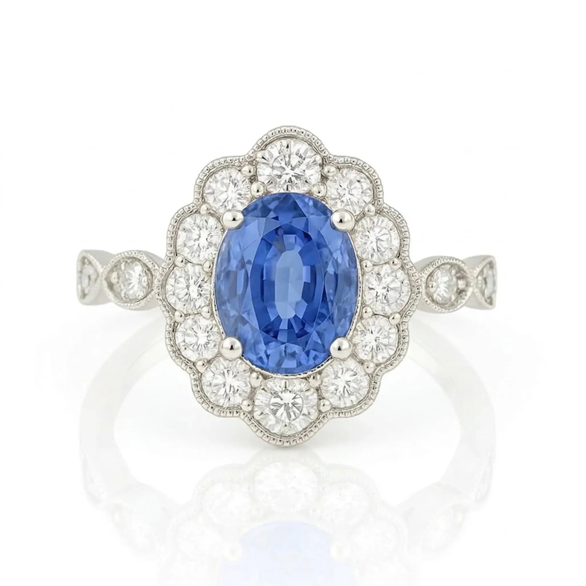 2.02ct Blue Sapphire Ring – Oval Halo, 18K Gold, F VS1 Diamonds Chloe's Jewellers