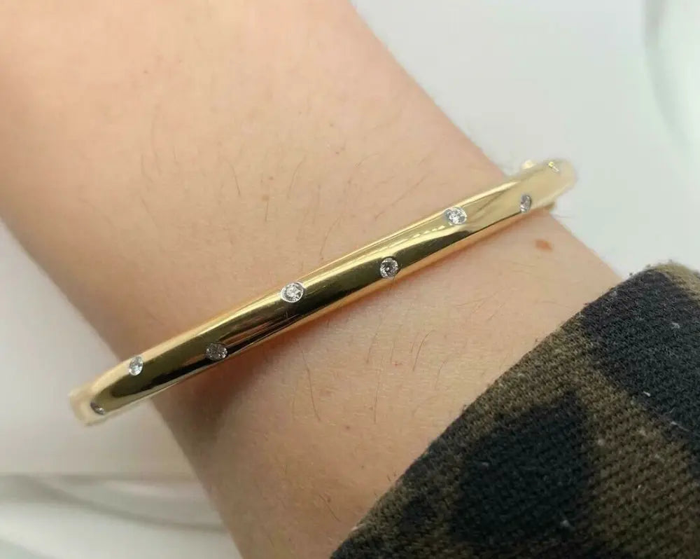 Pre-Owned | Tiffany & Co 18ct Yellow Gold and Diamond Etoile Bangle Chloe's Jewellers