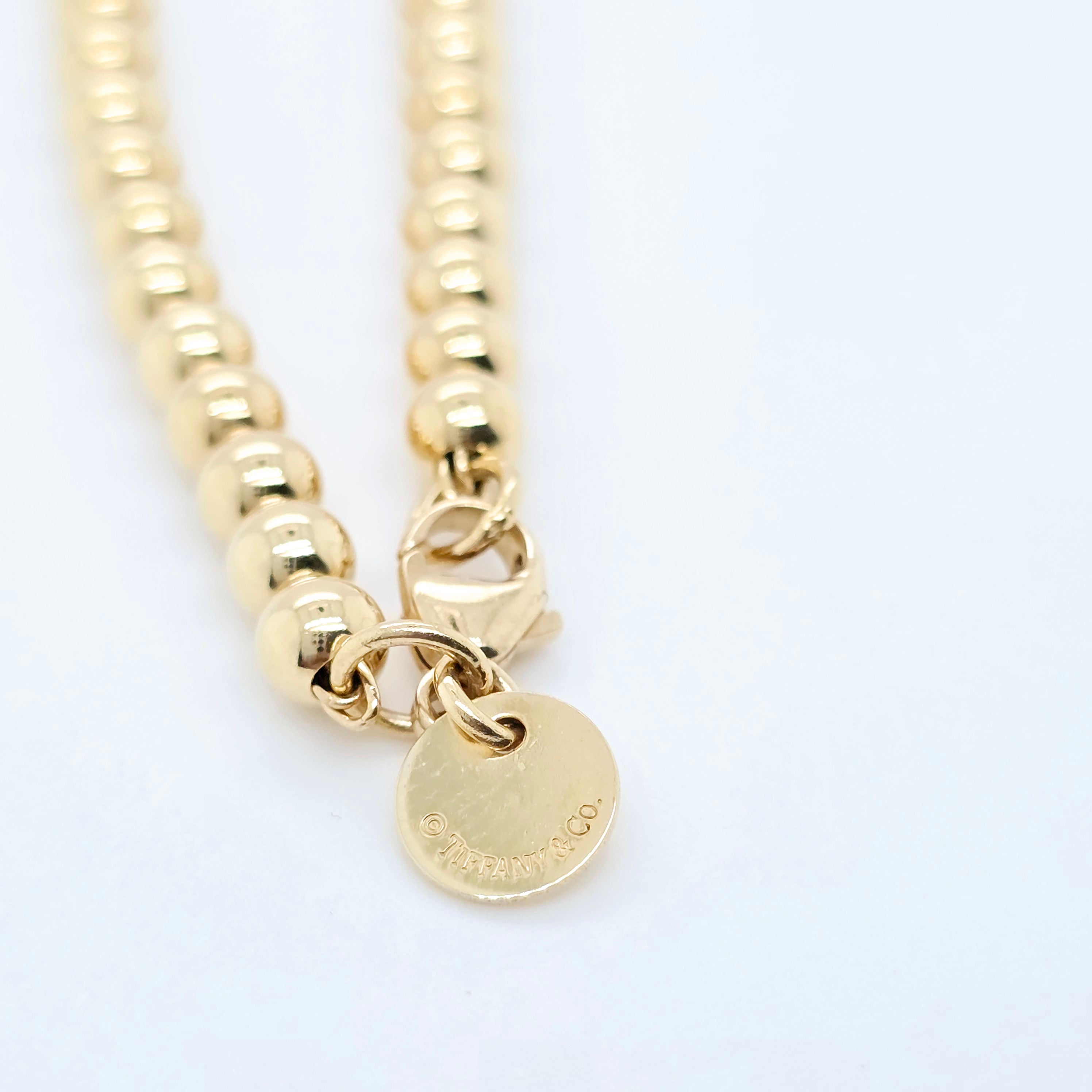 Tiffany & Co. Mini Heart Tag Bead Bracelet | 18K Gold | Red Enamel