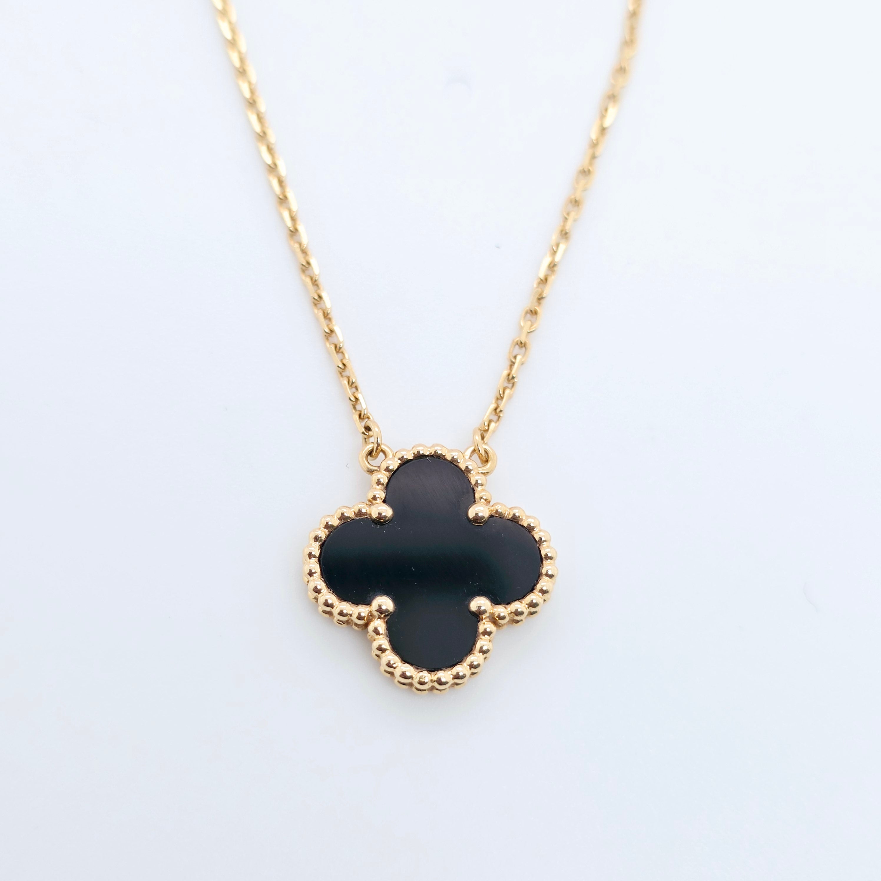 Van Cleef & Arpels Vintage Alhambra Pendant, Black Onyx, 18k Yellow Gold Chloe's Jewellers
