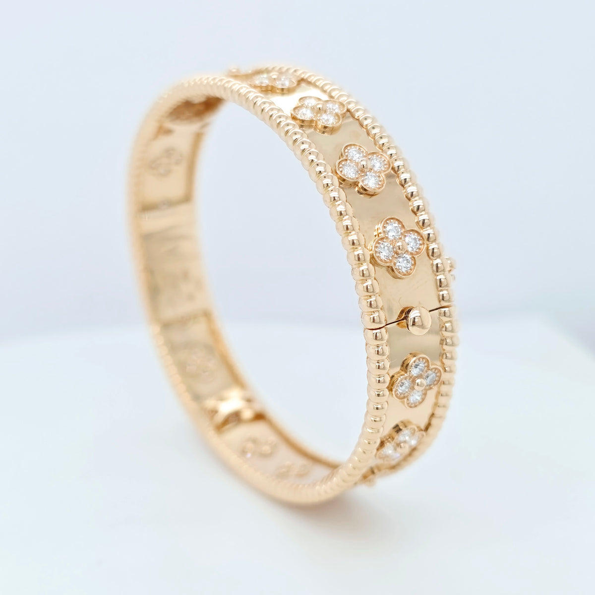 Van Cleef & Arpels Perlée clovers diamond bracelet in 18K rose gold , Size S