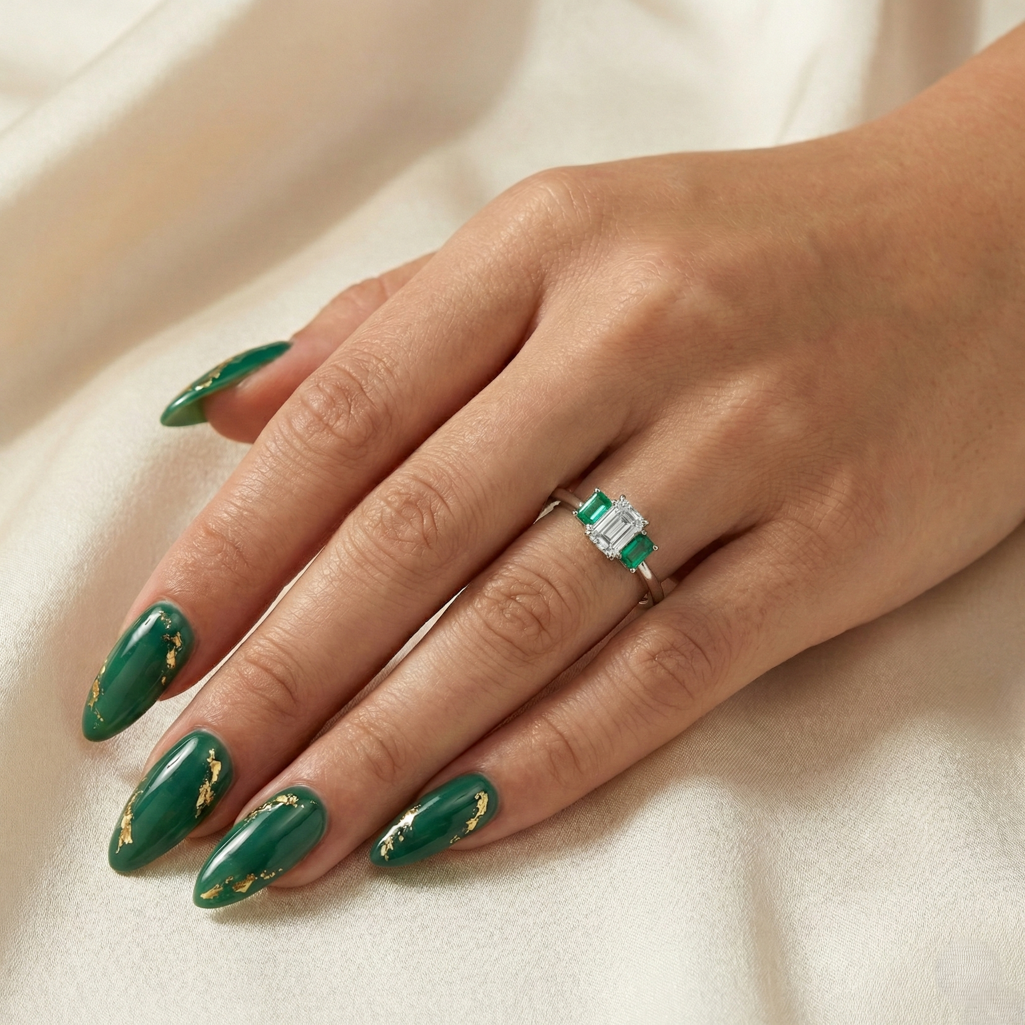 0.38ct Trilogy Setting Emerald Cut Engagement Ring with Green emerald side stones