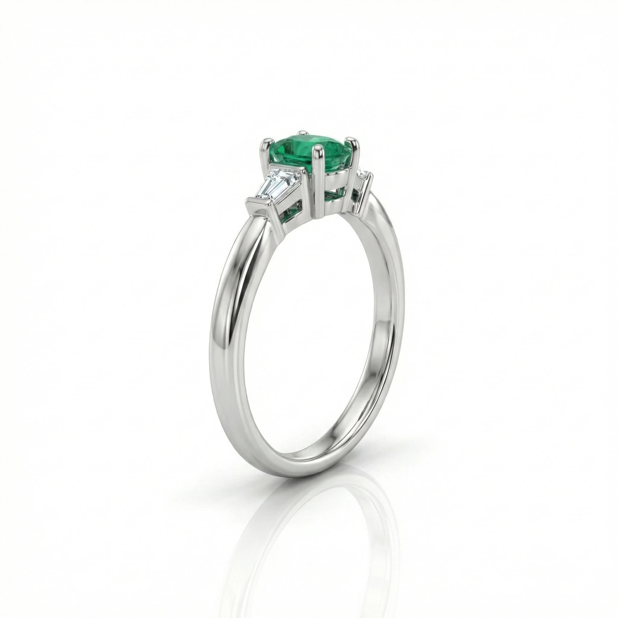 0.60ct Oval Cut Emerald Engagement Ring with Two Side Stones Chloe's Jewellers